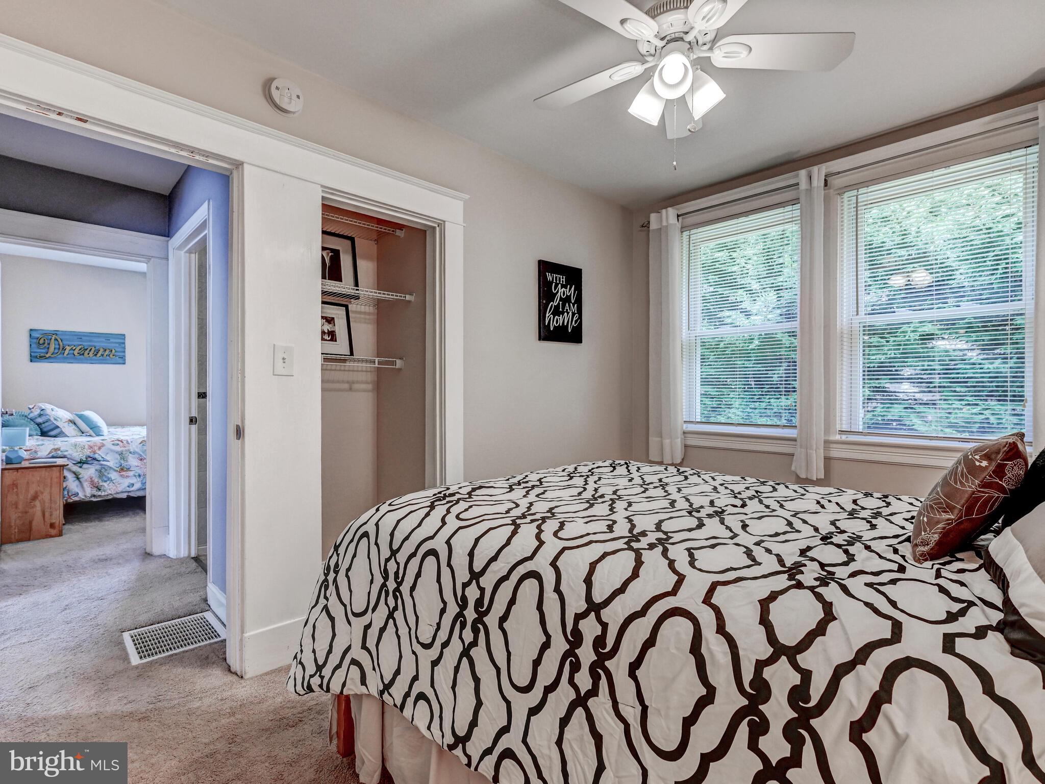 3932 Glenhurst Road Baltimore, MD 21222 - Photo 23 of 47 a bedroom with a bed and a window