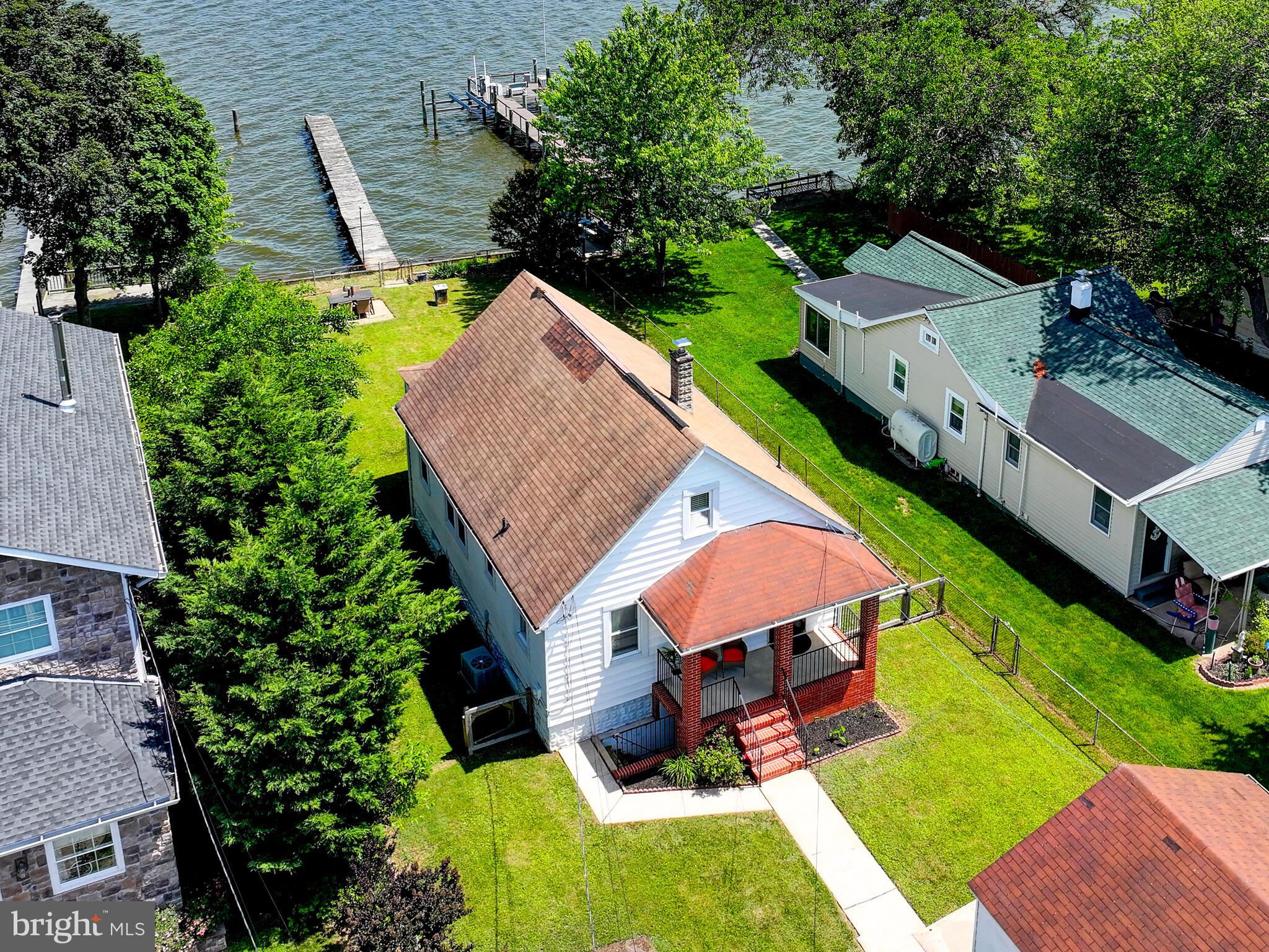 3932 Glenhurst Road Baltimore, MD 21222 - Photo 3 of 47 an aerial view of a house with swimming pool garden and patio