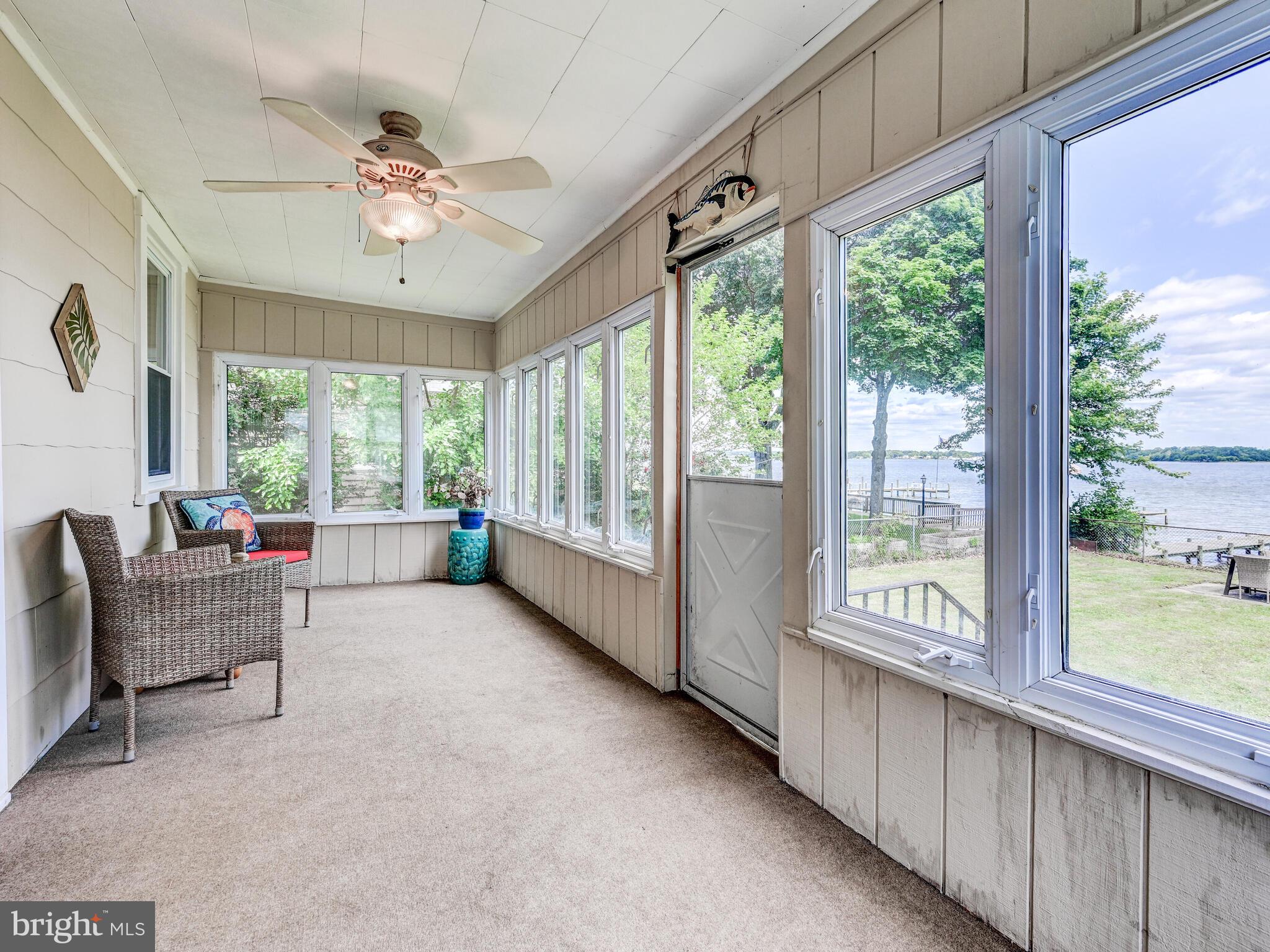 3932 Glenhurst Road Baltimore, MD 21222 - Photo 32 of 47 a living room with furniture and a large window