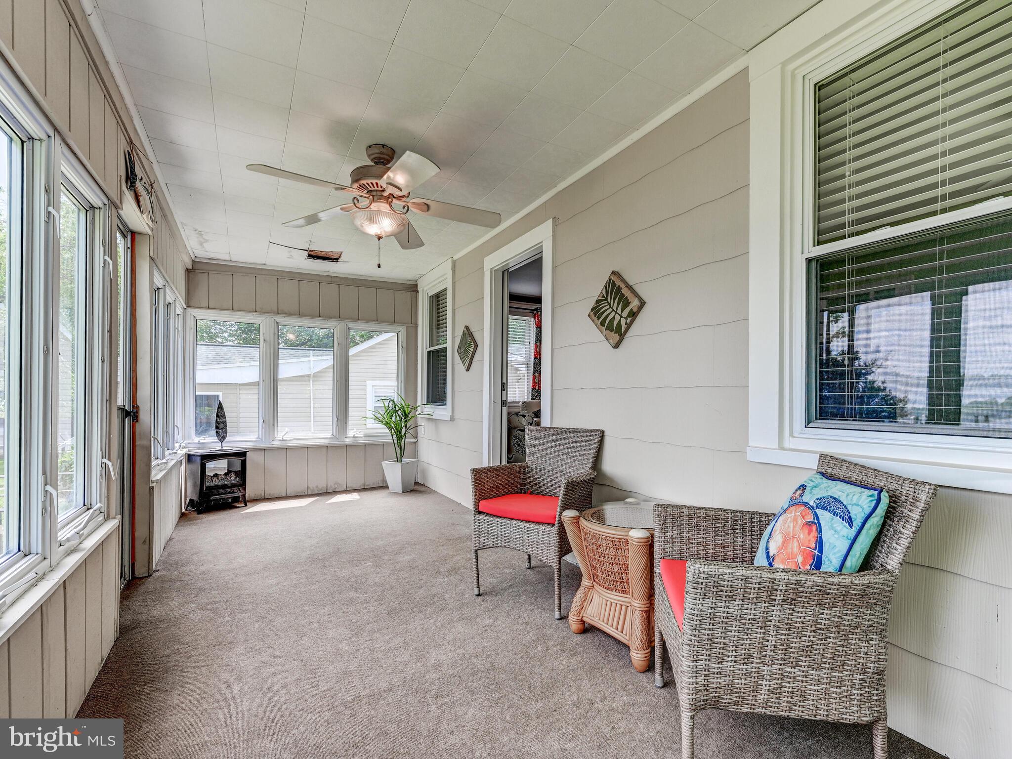 3932 Glenhurst Road Baltimore, MD 21222 - Photo 33 of 47 a living room with furniture and windows