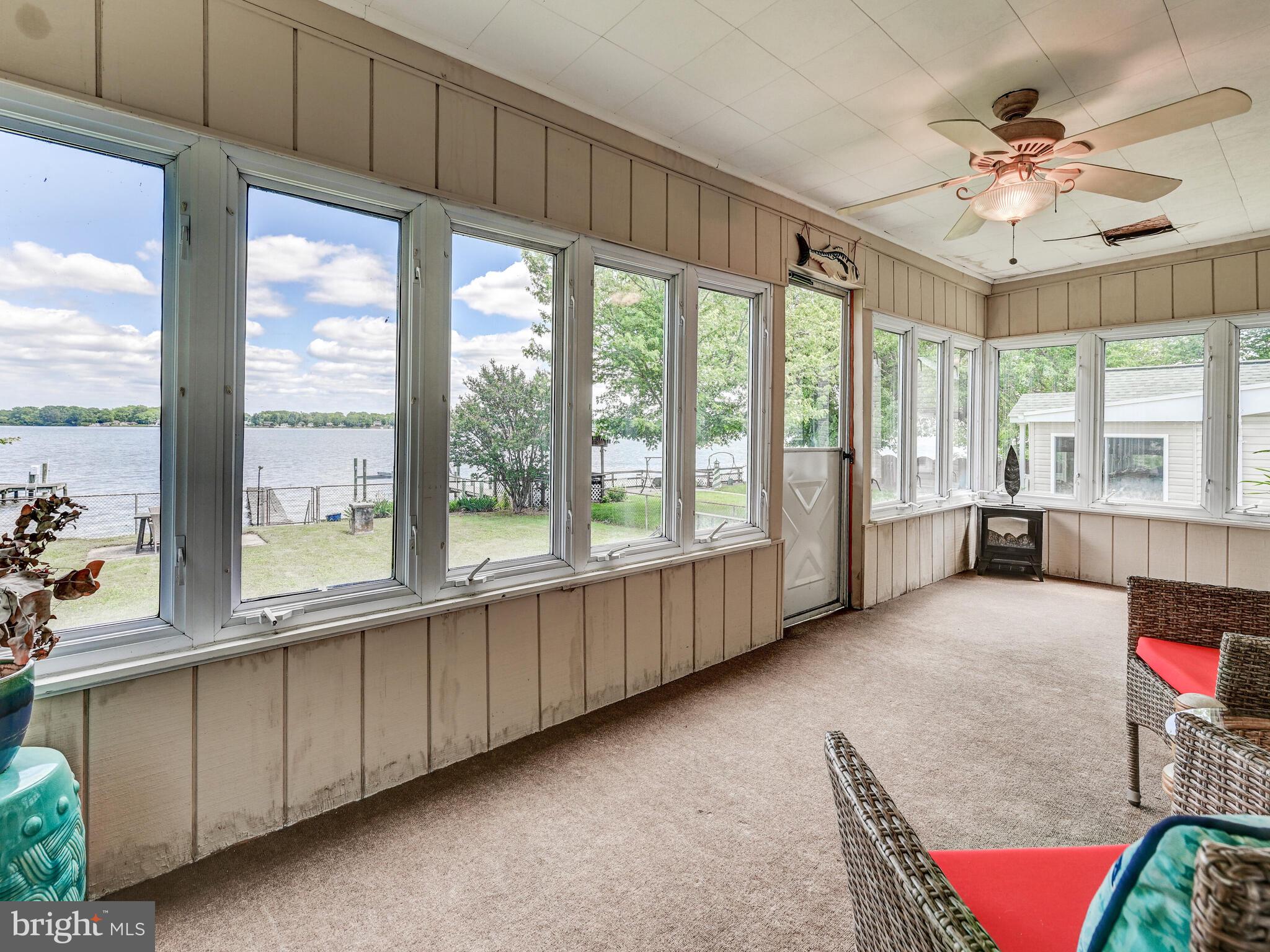 3932 Glenhurst Road Baltimore, MD 21222 - Photo 34 of 47 a living room with furniture and a large window