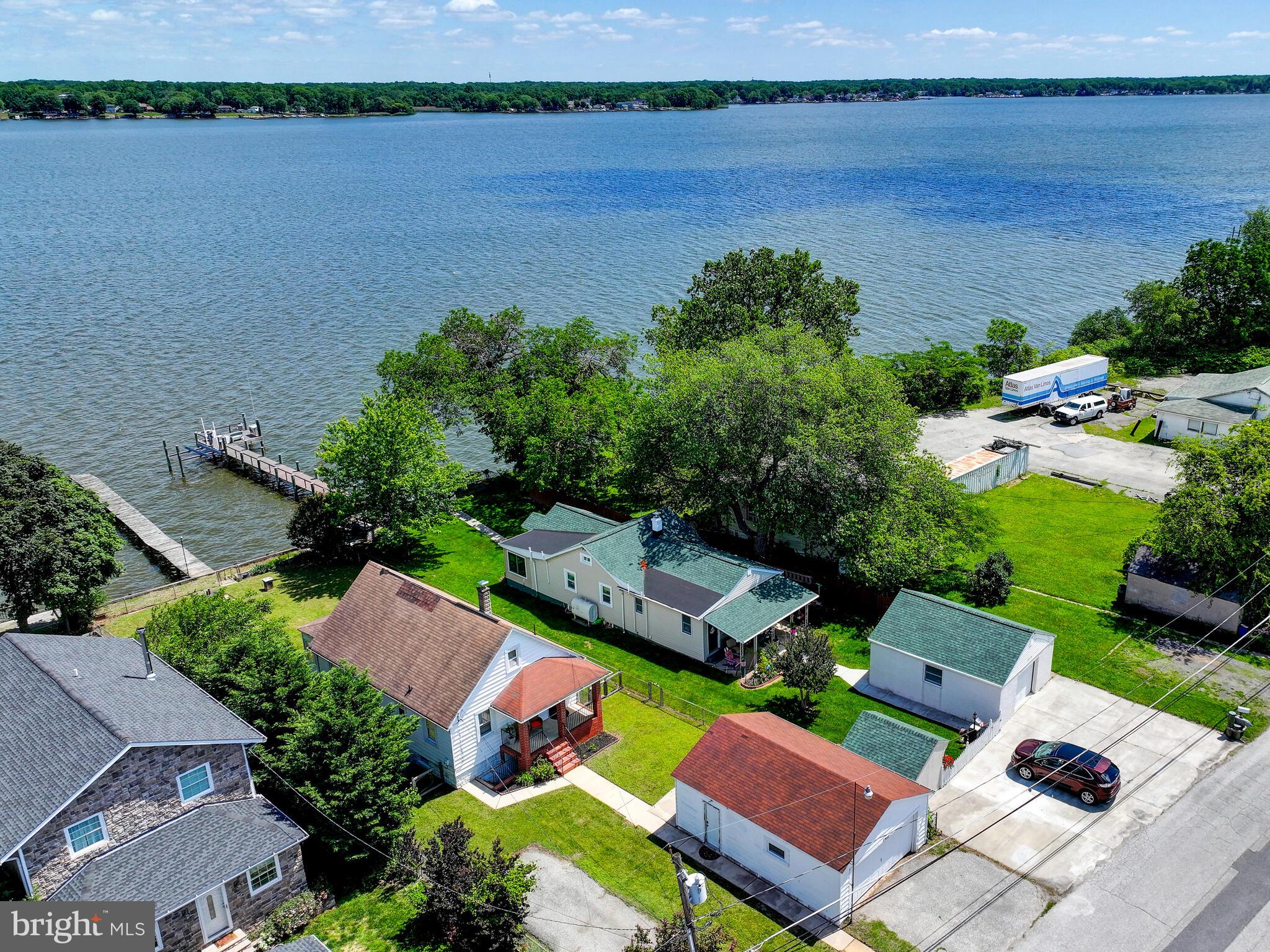 3932 Glenhurst Road Baltimore, MD 21222 - Photo 43 of 47 an aerial view of a house with garden space and lake view