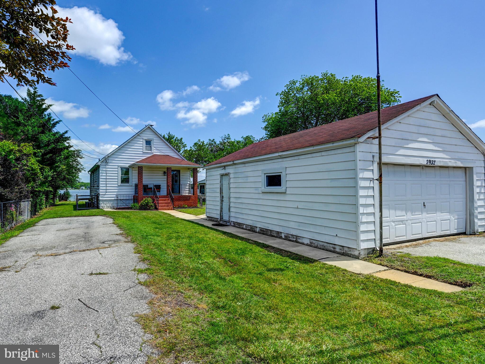 3932 Glenhurst Road Baltimore, MD 21222 - Photo 44 of 47 a front view of a house with a yard