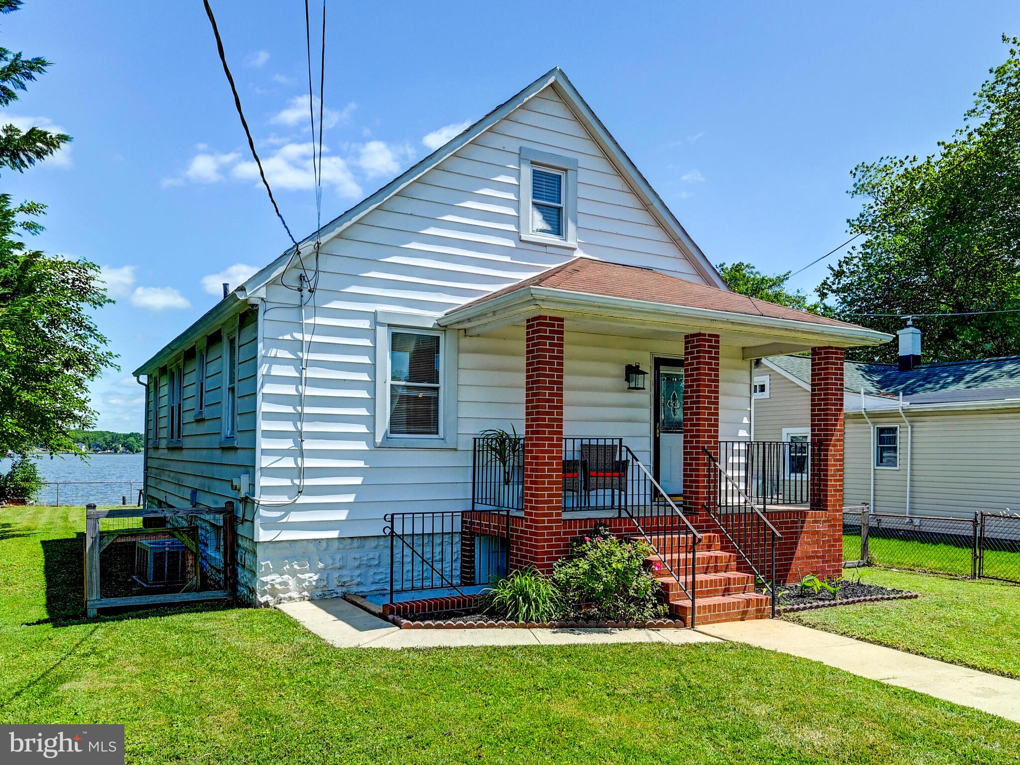 3932 Glenhurst Road Baltimore, MD 21222 - Photo 5 of 47 a view of a house with a backyard