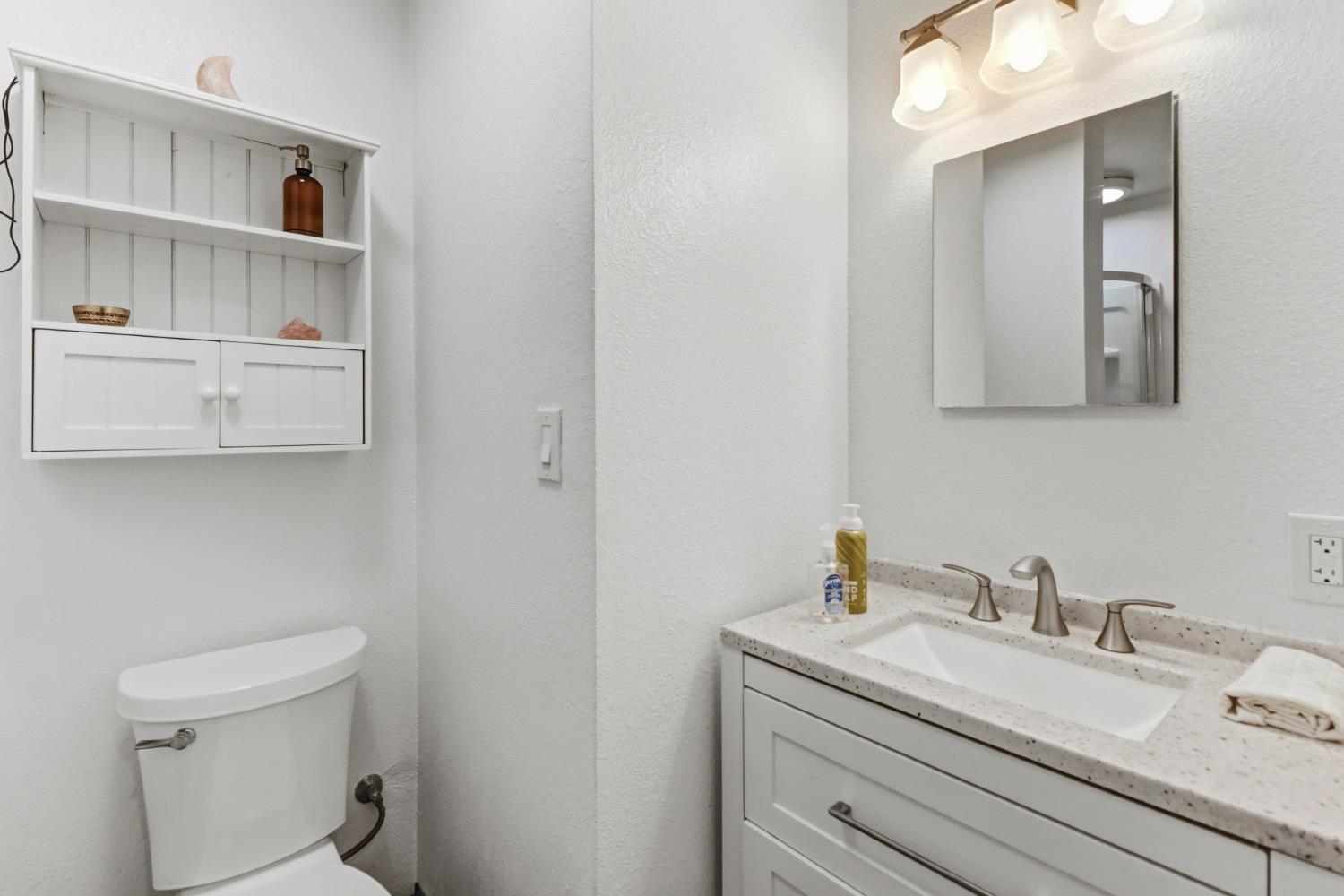 4330 Cavitt Stallman Road Granite Bay, CA 95746 - Photo 47 of 85 a bathroom with a sink and a toilet