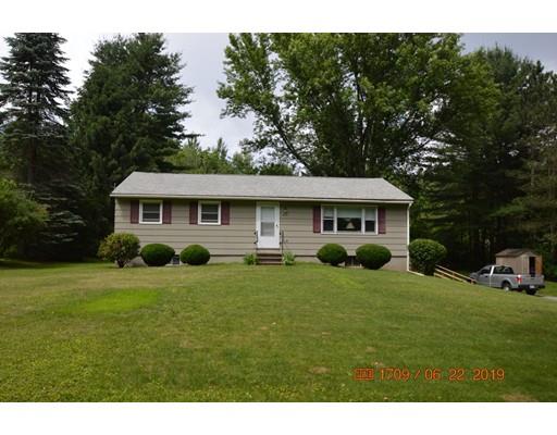 651 Sterling Road Lancaster, MA 01523 - Photo 1 of 12 a view of a house with a yard