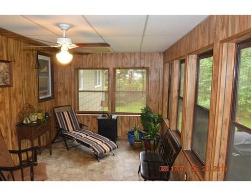 651 Sterling Road Lancaster, MA 01523 - Photo 5 of 12 a living room with furniture and a window