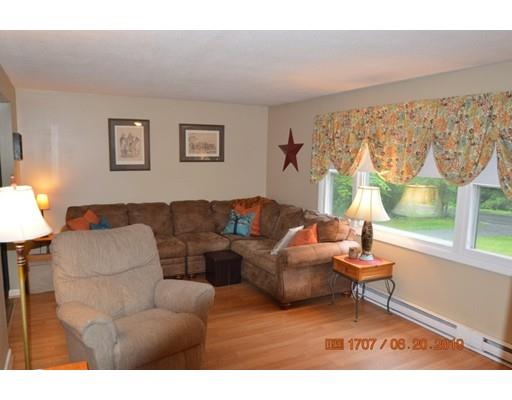 651 Sterling Road Lancaster, MA 01523 - Photo 7 of 12 a living room with furniture and a large window