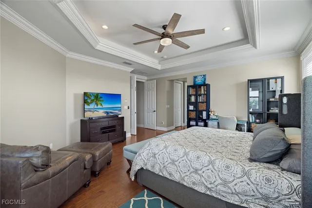 a large bathroom with a double vanity sink a mirror and a bathtub