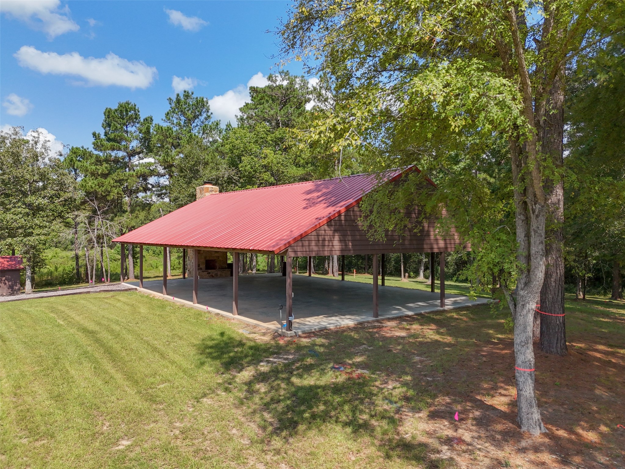 12-22-76 Granite Road Conroe, TX 77304 - Photo 3 of 21 a view of a house with a yard