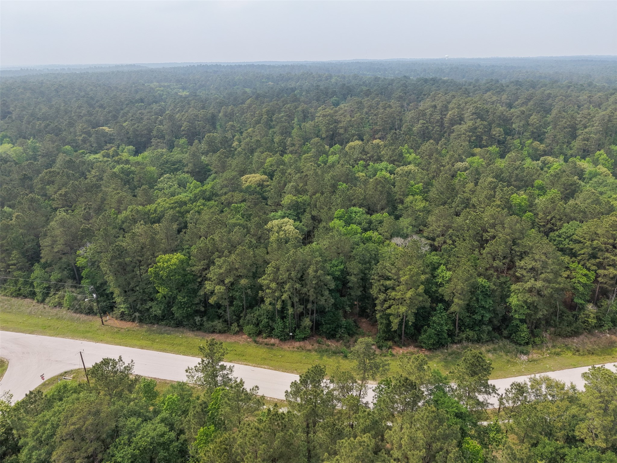 12-22-76 Granite Road Conroe, TX 77304 - Photo 10 of 21 a view of a field with an ocean