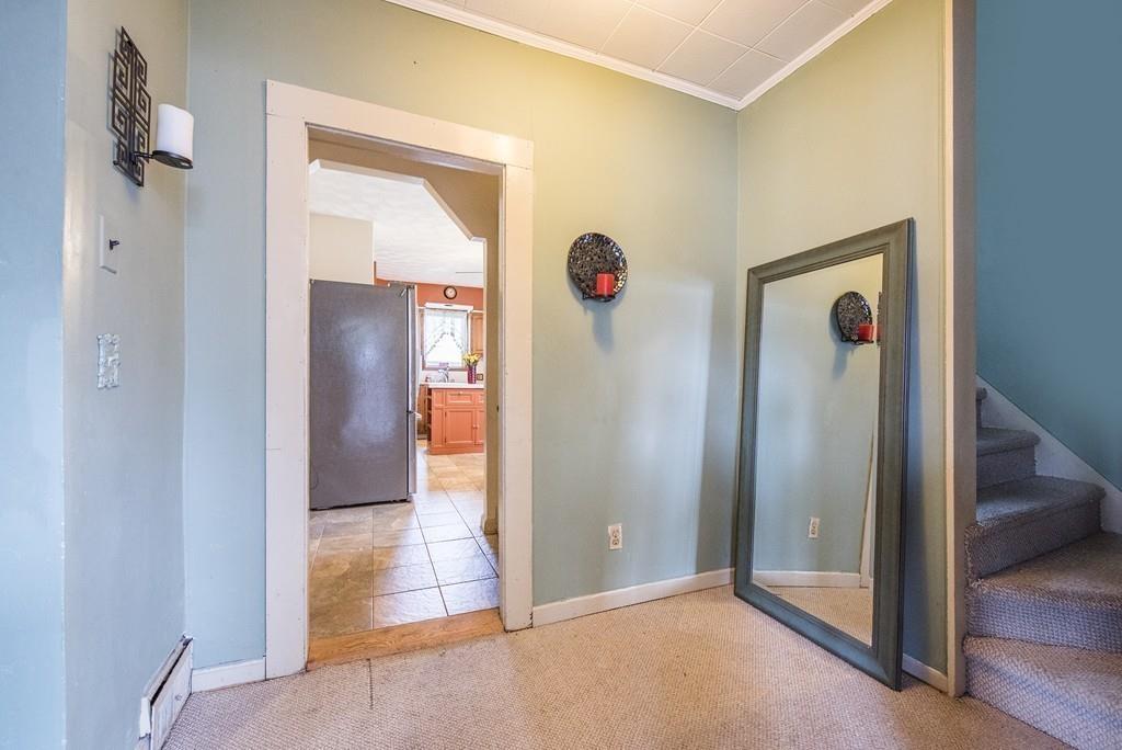 46 Parkside Street Springfield, MA 01104 - Photo 11 of 23 a view of a hallway with front door