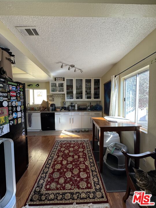 1724 Broadway Street Oceanside, CA 92054 - Photo 17 of 19 a kitchen with stainless steel appliances granite countertop a stove top oven and cabinets
