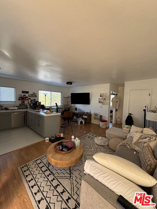 1724 Broadway Street Oceanside, CA 92054 - Photo 19 of 19 a living room with furniture and a flat screen tv