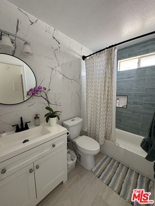 1724 Broadway Street Oceanside, CA 92054 - Photo 5 of 19 a bathroom with a toilet sink and shower