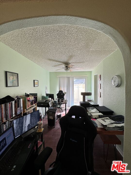 1724 Broadway Street Oceanside, CA 92054 - Photo 8 of 19 a living room with furniture window and book shelf