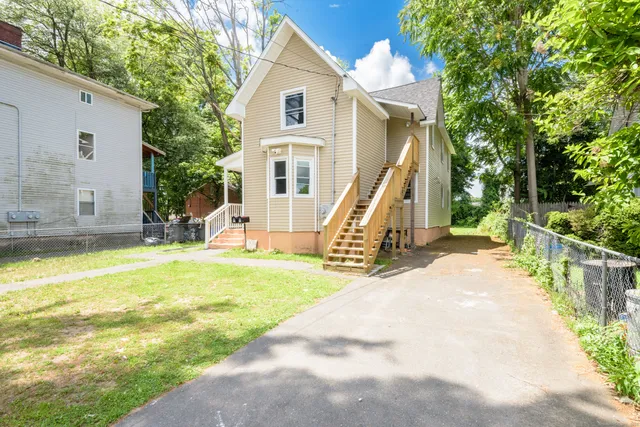 a view of a house with a swimming pool