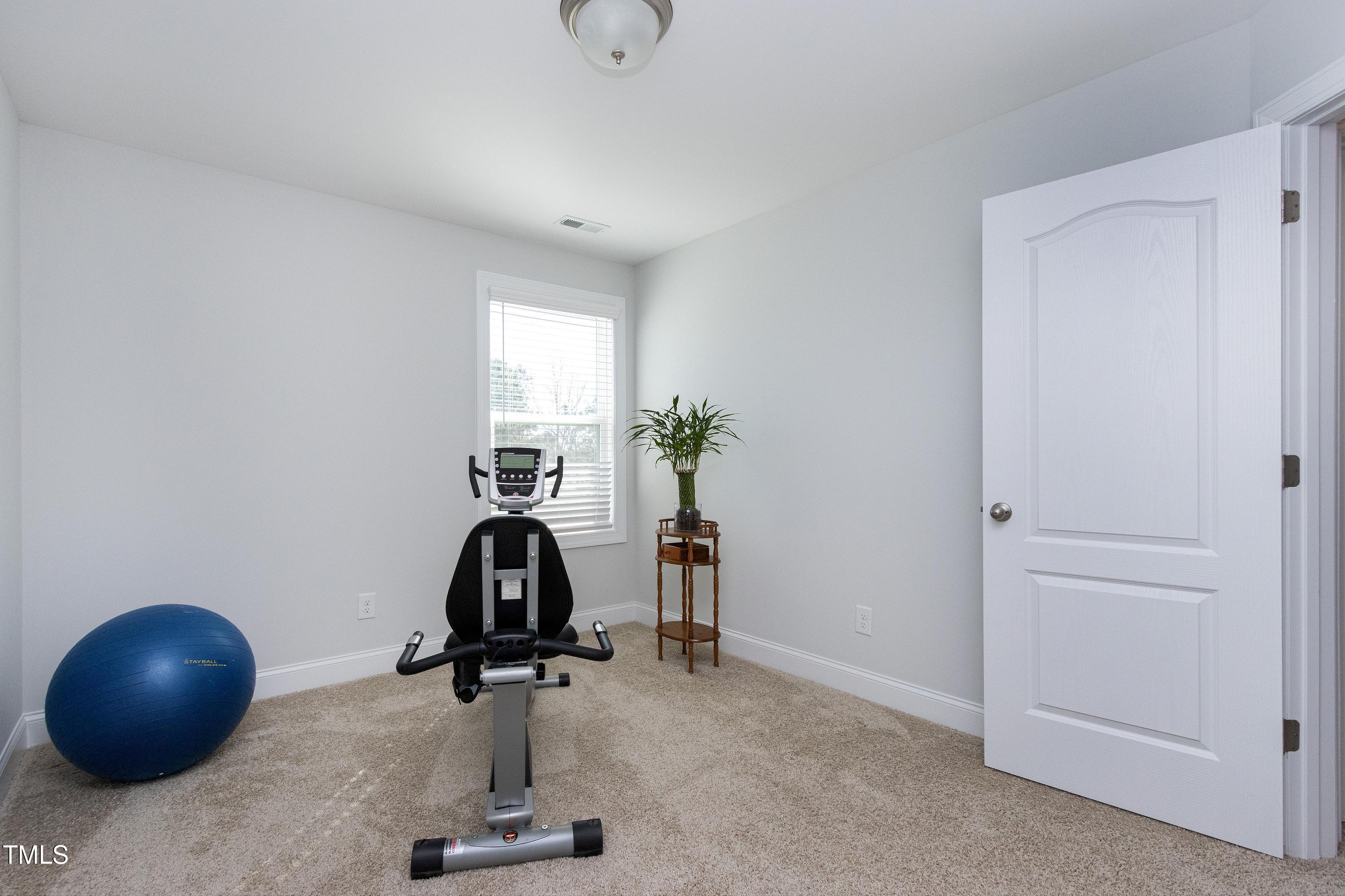 1613 Osprey Ridge Drive Willow Spring, NC 27592 - Photo 25 of 37 Bedroom 3