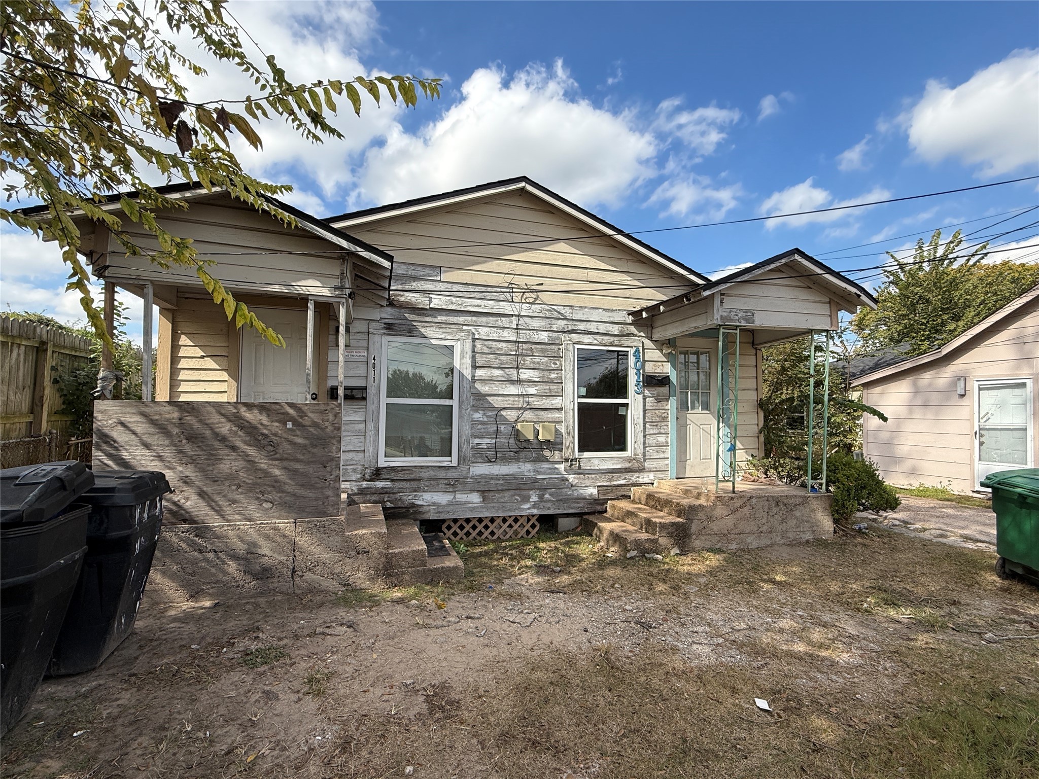 4011-4017 Terry Street Houston, TX 77009 - Photo 11 of 48 a front view of a house with garden
