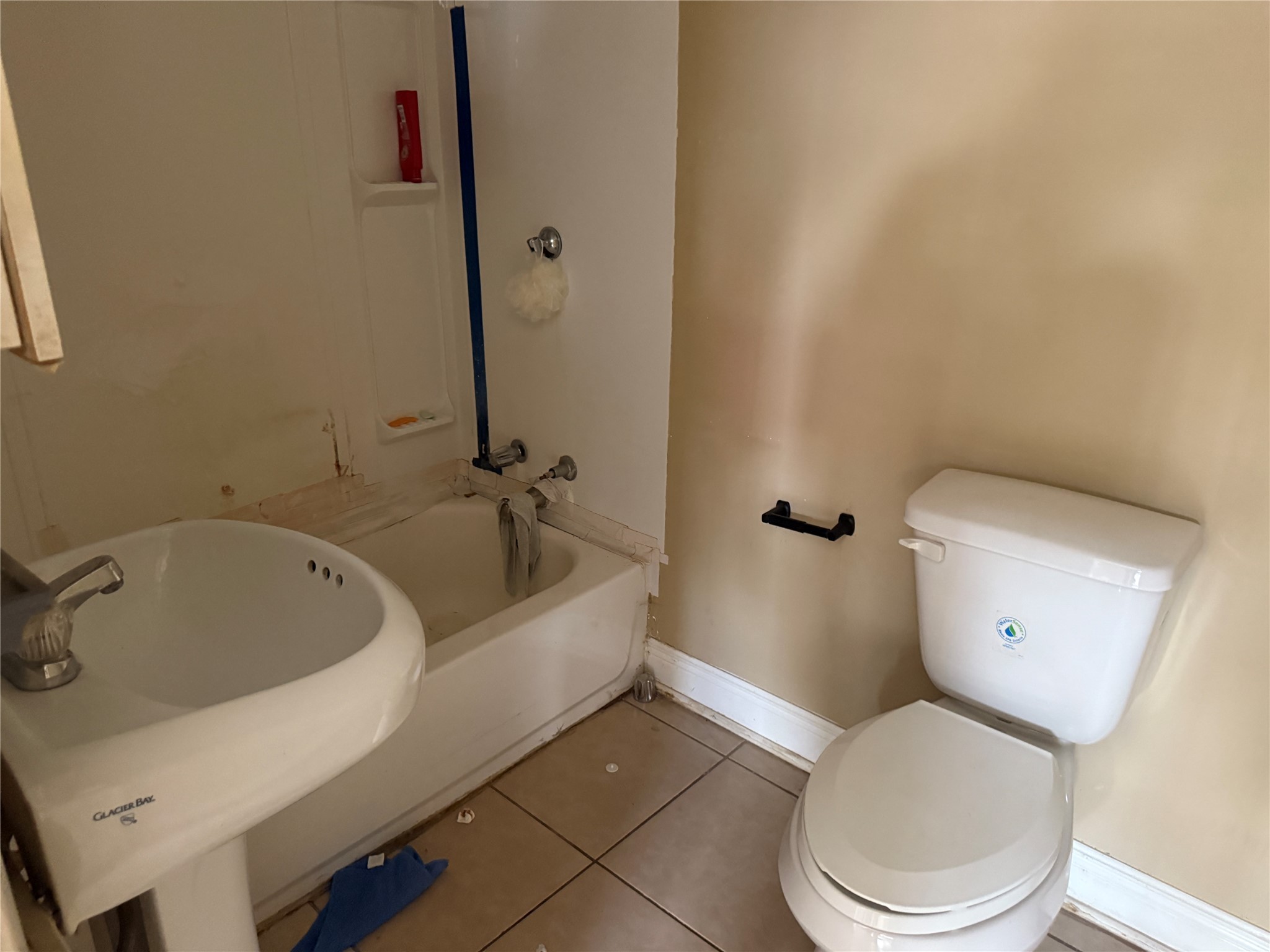 4011-4017 Terry Street Houston, TX 77009 - Photo 33 of 48 a white toilet sitting next to a bath tub