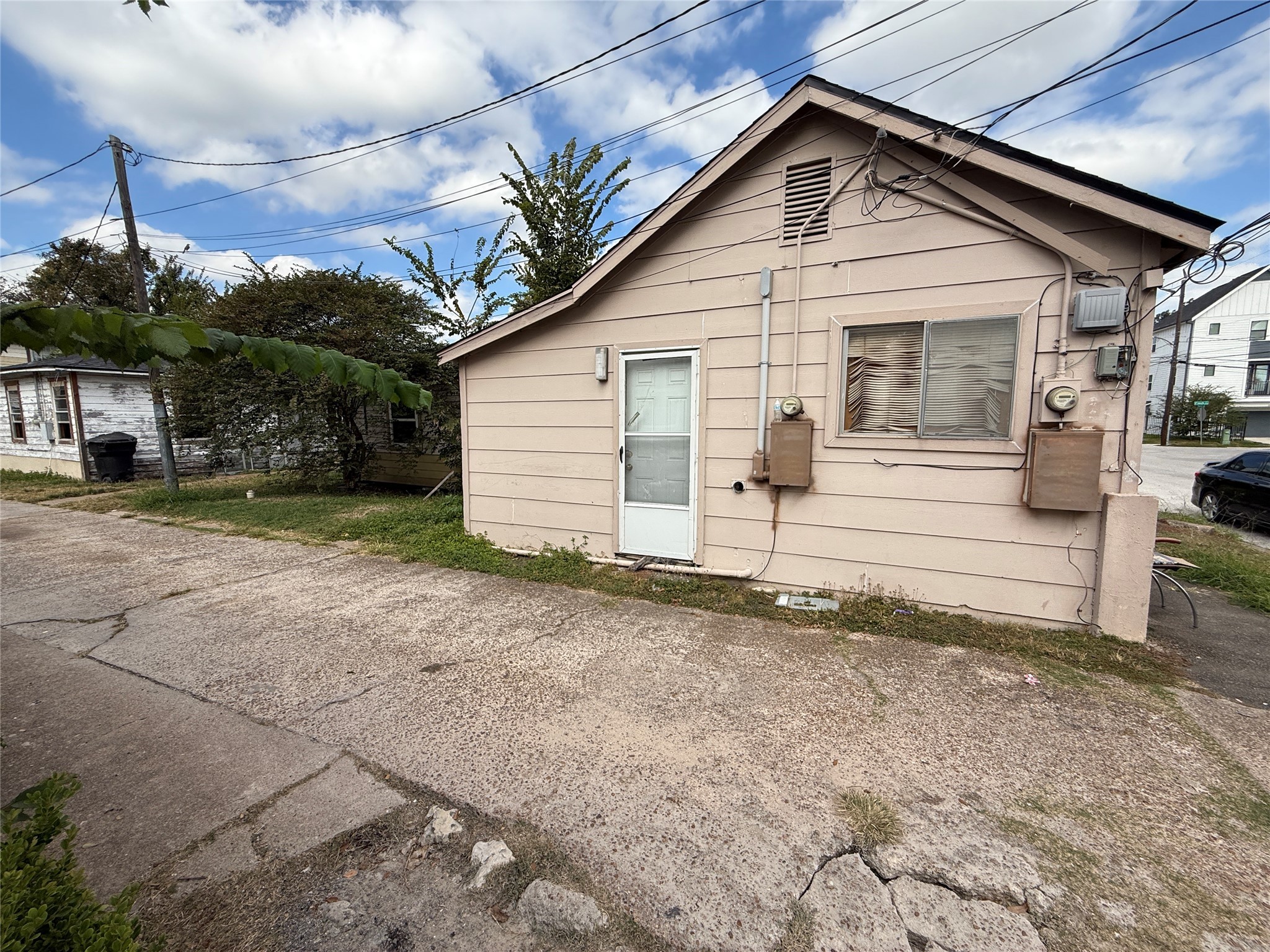 4011-4017 Terry Street Houston, TX 77009 - Photo 37 of 48 a view of a house with a yard and garage