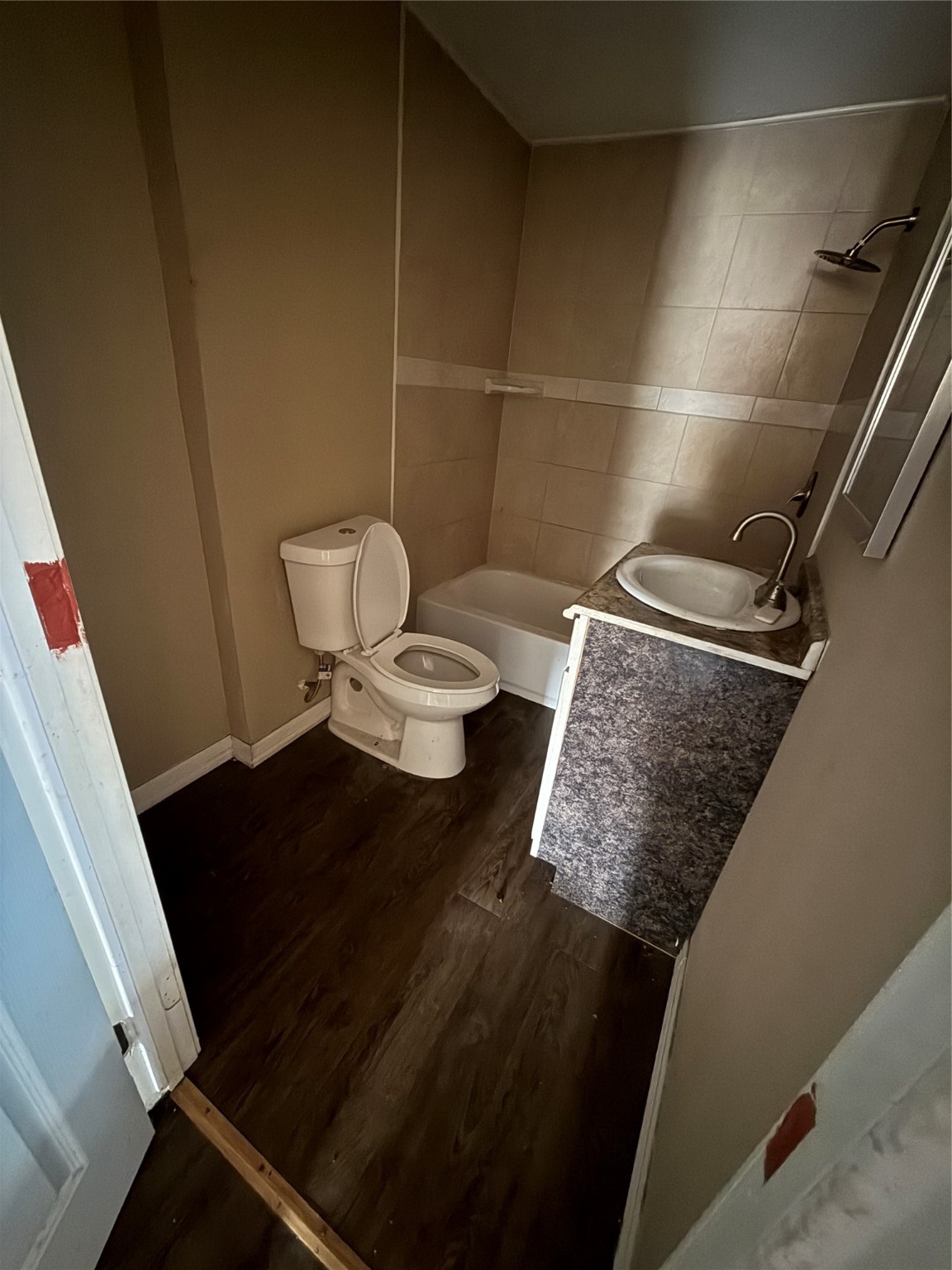 4011-4017 Terry Street Houston, TX 77009 - Photo 46 of 48 a bathroom with a sink and a toilet