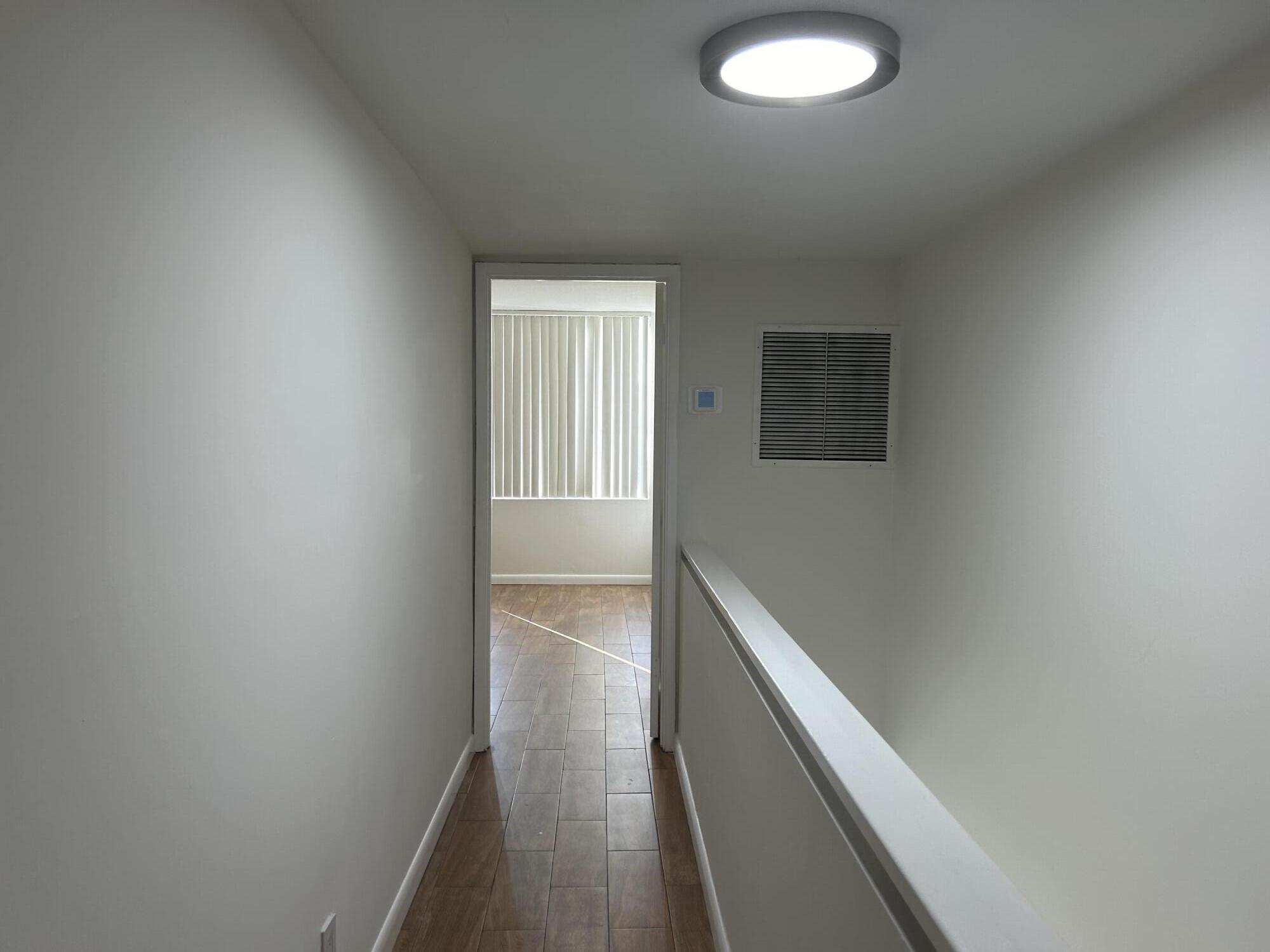 1401 South Federal Highway, Unit 215 Boca Raton, FL 33432 - Photo 23 of 33 Upstairs hallway between bedrooms