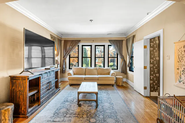 a living room with furniture and a window