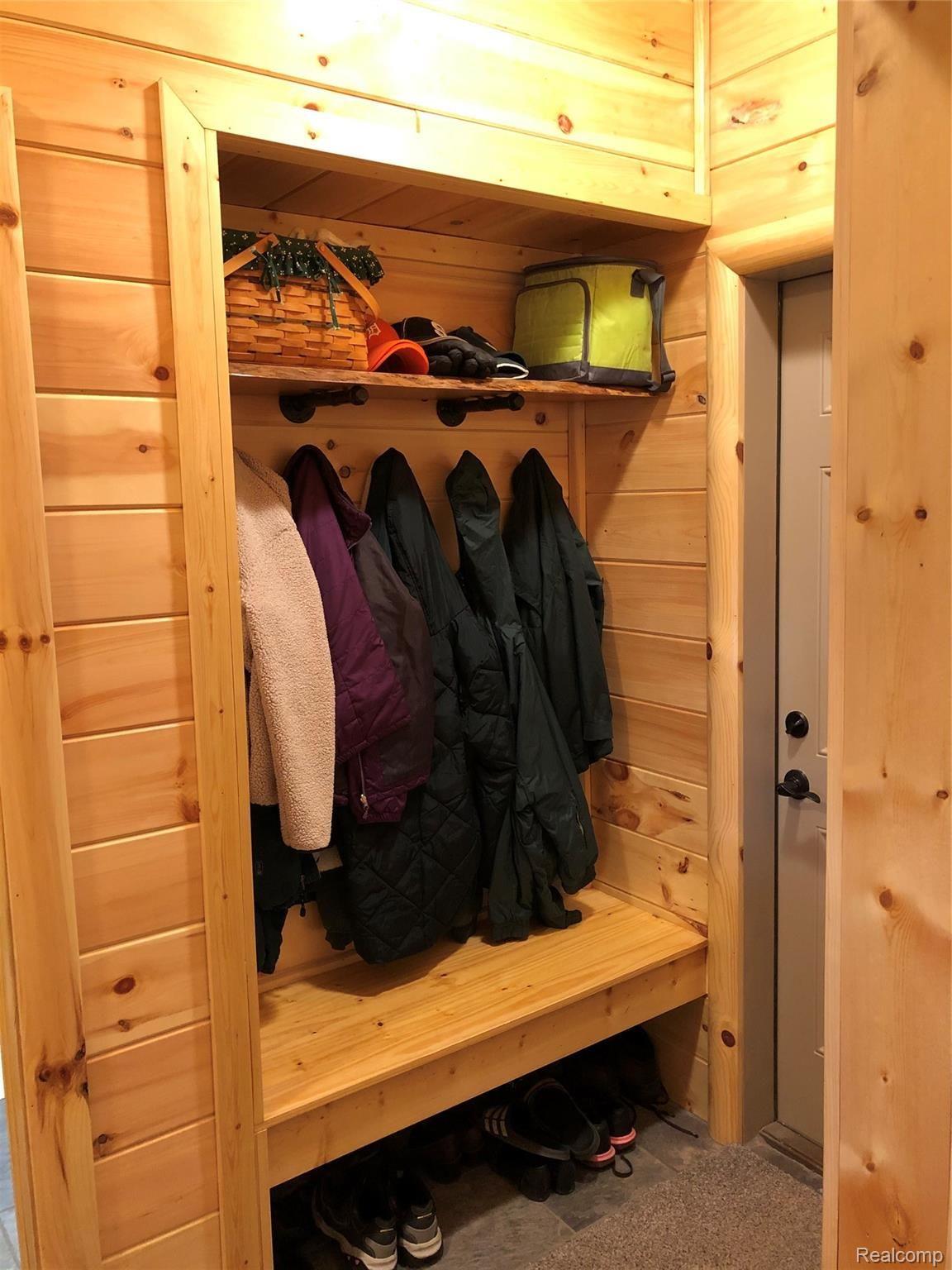 6263 General Squier Road Almont, MI 48003 - Photo 25 of 45 Built-in organization at garage access door
