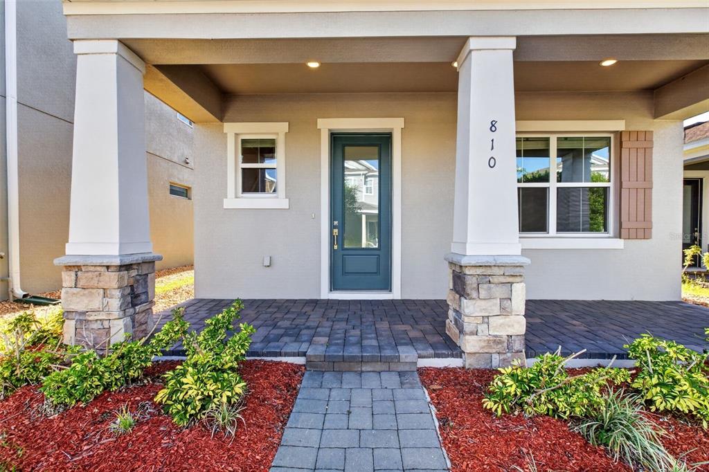 810 MIDDLETON Street DeBary, FL 32713 - Photo 3 of 52 a front view of a house with a yard