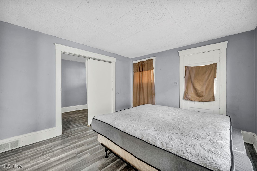 3405 Roehl Avenue Cleveland, OH 44109 - Photo 27 of 50 Bedroom featuring baseboards and wood finished floors