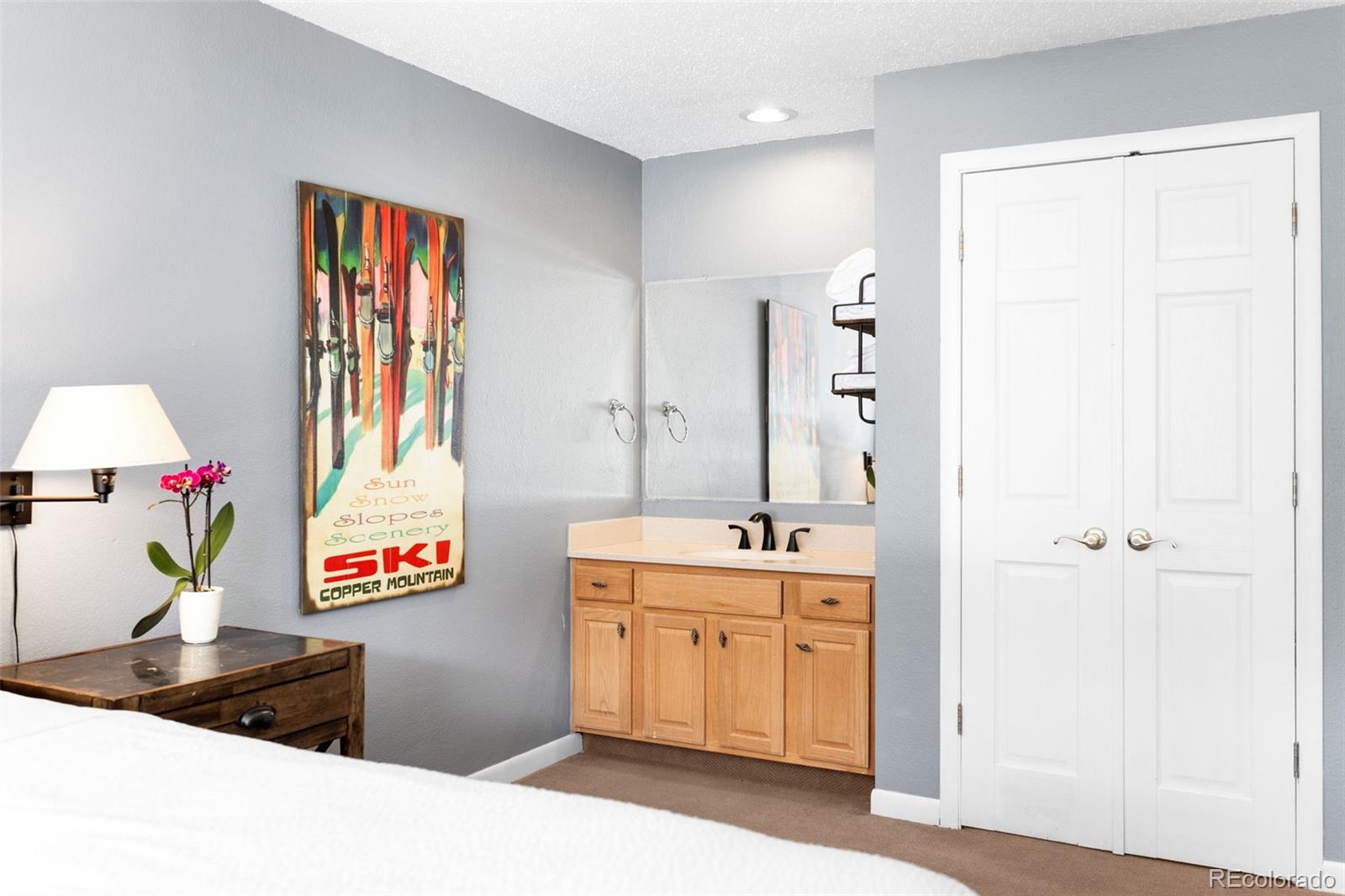 760 Copper Road, Unit F204 Frisco, CO 80443 - Photo 16 of 30 a living room with a sink and a window