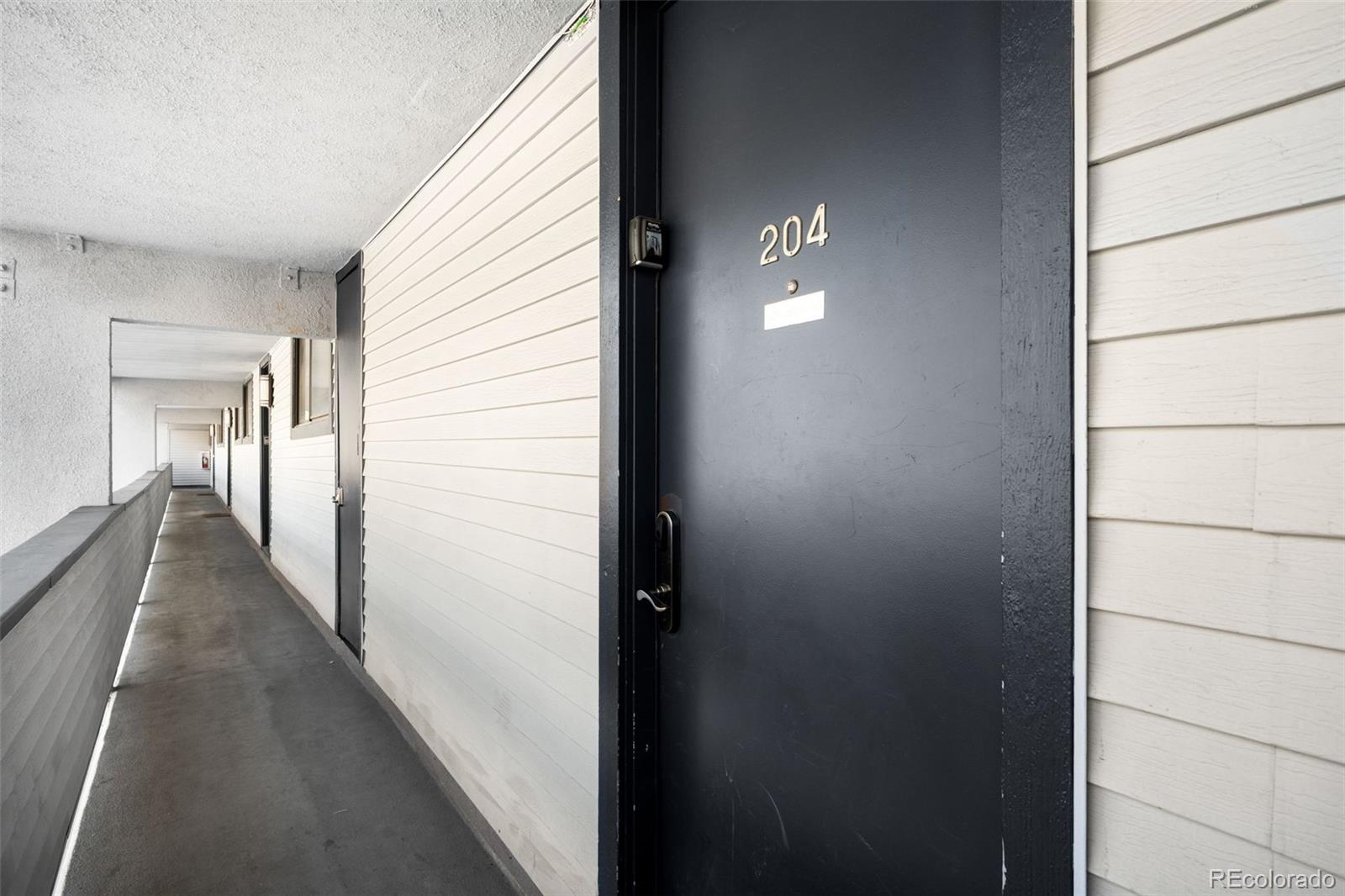 760 Copper Road, Unit F204 Frisco, CO 80443 - Photo 24 of 30 a view of a hallway with a elevator