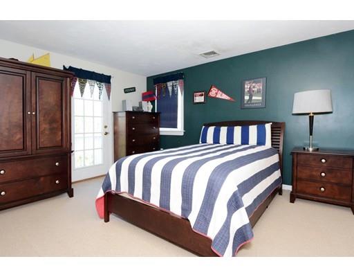 38 Thoreau Circle Beverly, MA 01915 - Photo 20 of 26 a bed room with a bed and a window