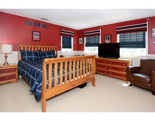 38 Thoreau Circle Beverly, MA 01915 - Photo 21 of 26 a living room with furniture a flat screen tv and a window