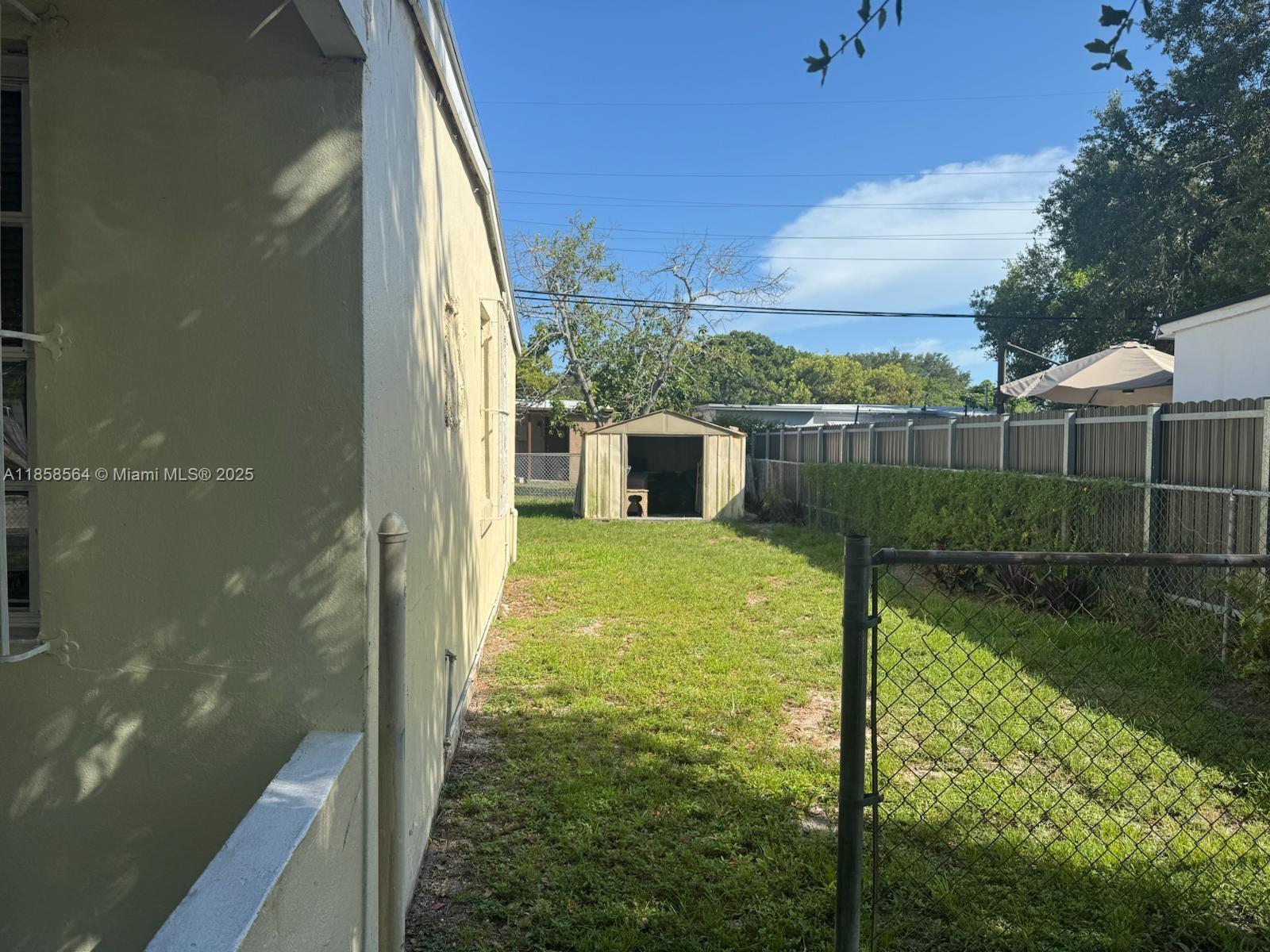 2060 Rutland Street Opa-Locka, FL 33054 - Photo 4 of 10 a view of a small yard
