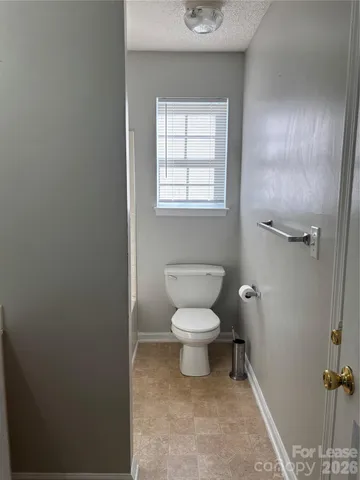a bathroom with a toilet