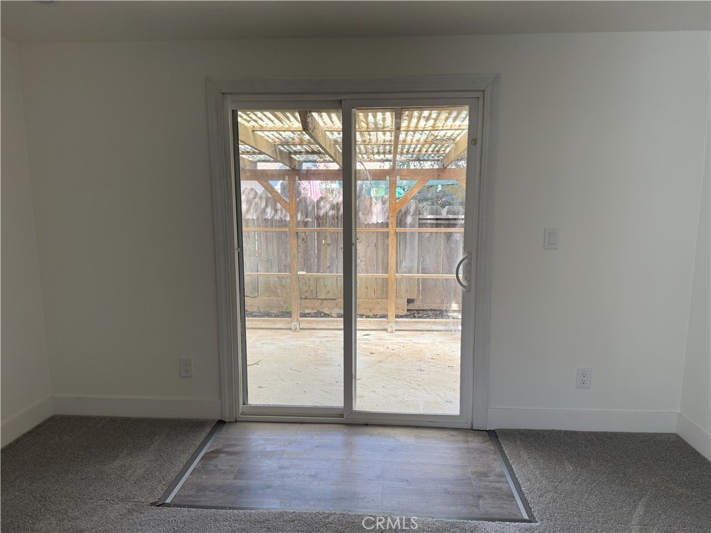3835 Gardiner Ferry Road, Unit 98 Corning, CA 96021 - Photo 7 of 11 a view of an empty room and window