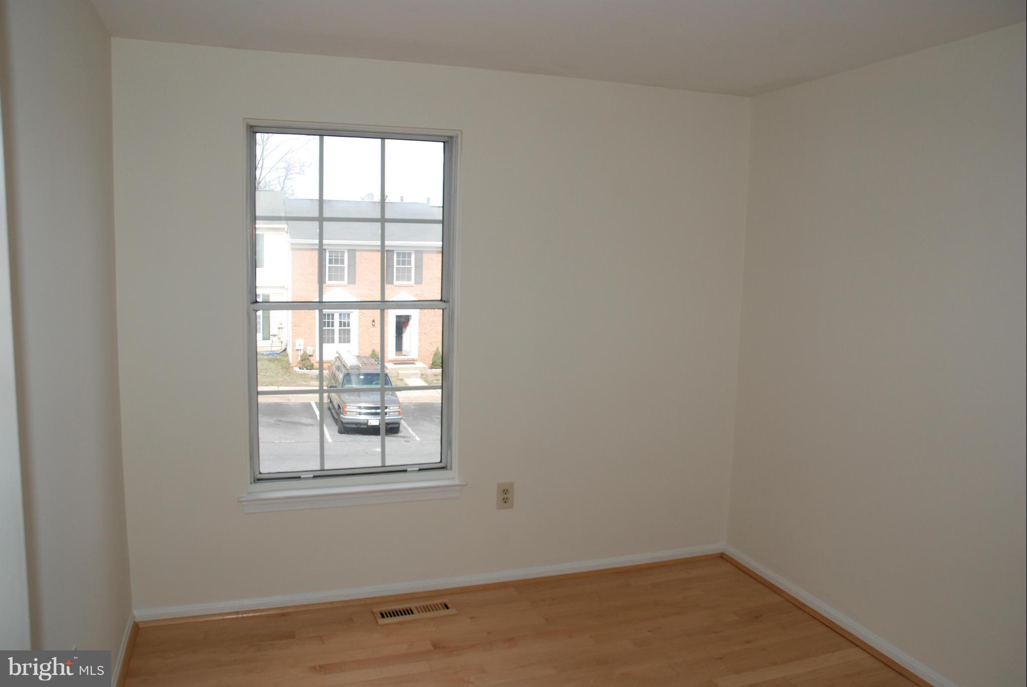 13310 Country Ridge Drive Germantown, MD 20874 - Photo 14 of 26 an empty room with a window