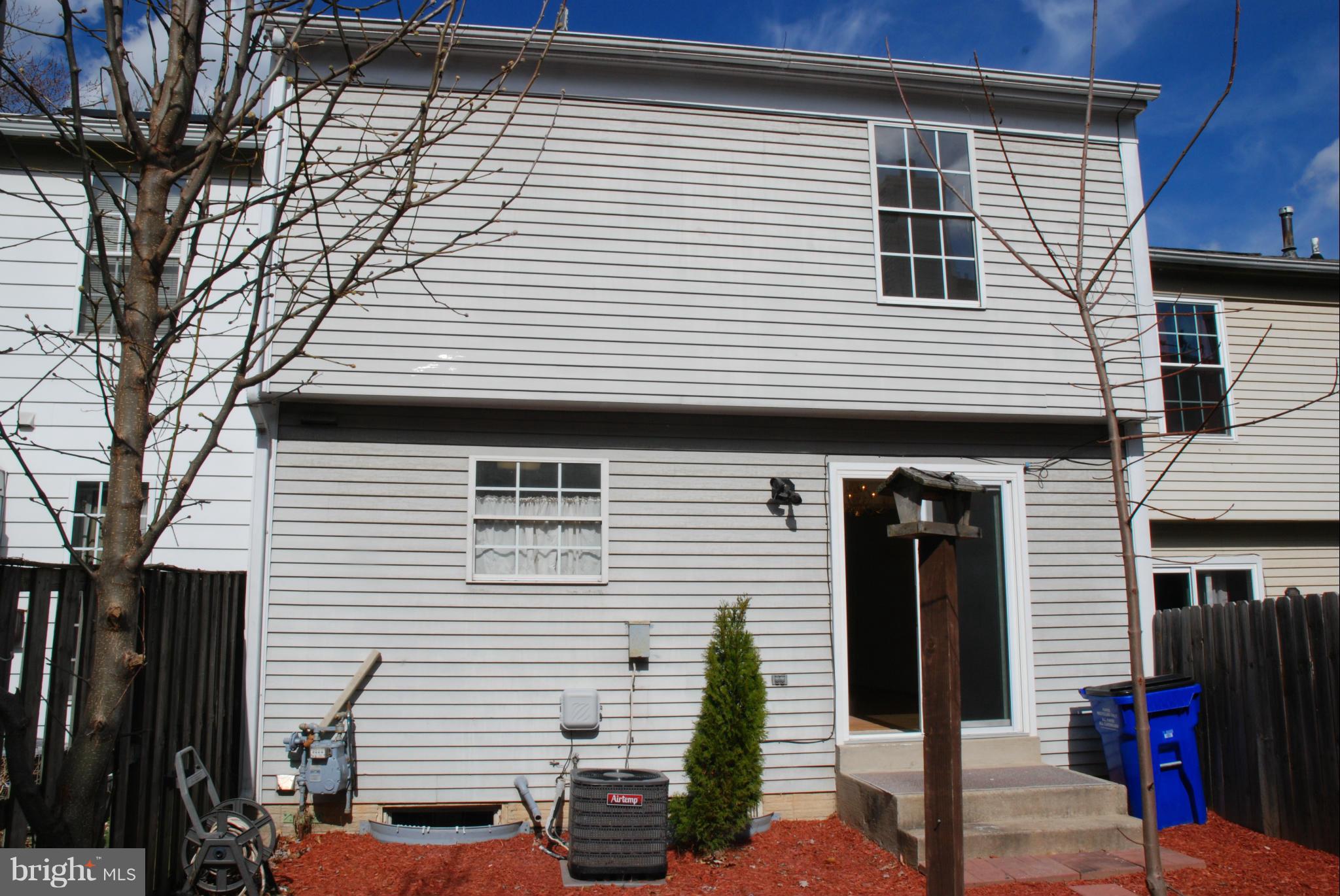 13310 Country Ridge Drive Germantown, MD 20874 - Photo 18 of 26 a view of a house with a street