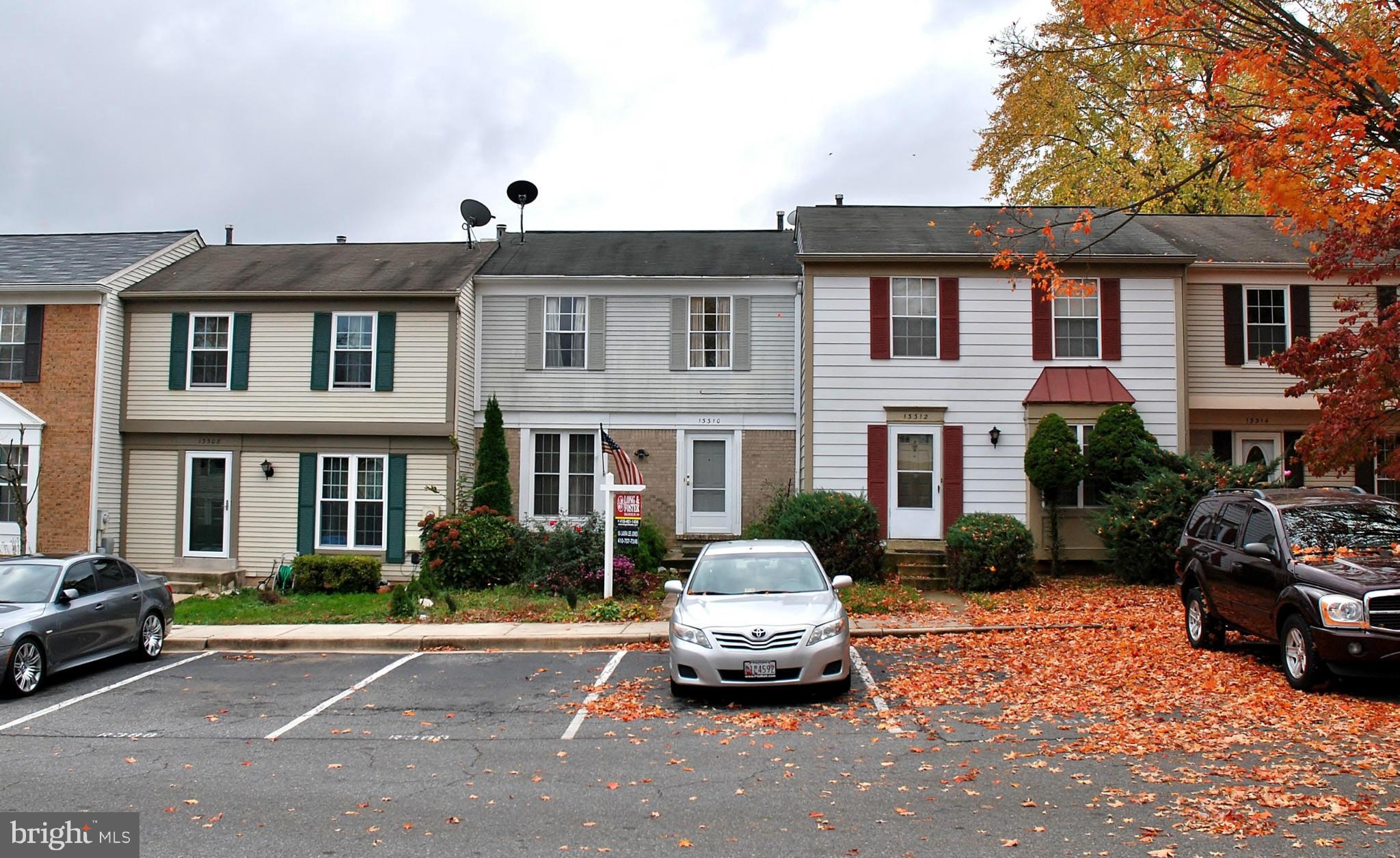 13310 Country Ridge Drive Germantown, MD 20874 - Photo 22 of 26 a car parked in front of a house