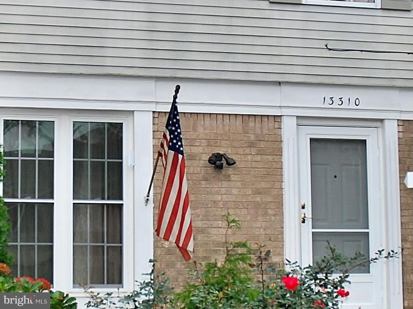 13310 Country Ridge Drive Germantown, MD 20874 - Photo 23 of 26 a front view of a house with a garage
