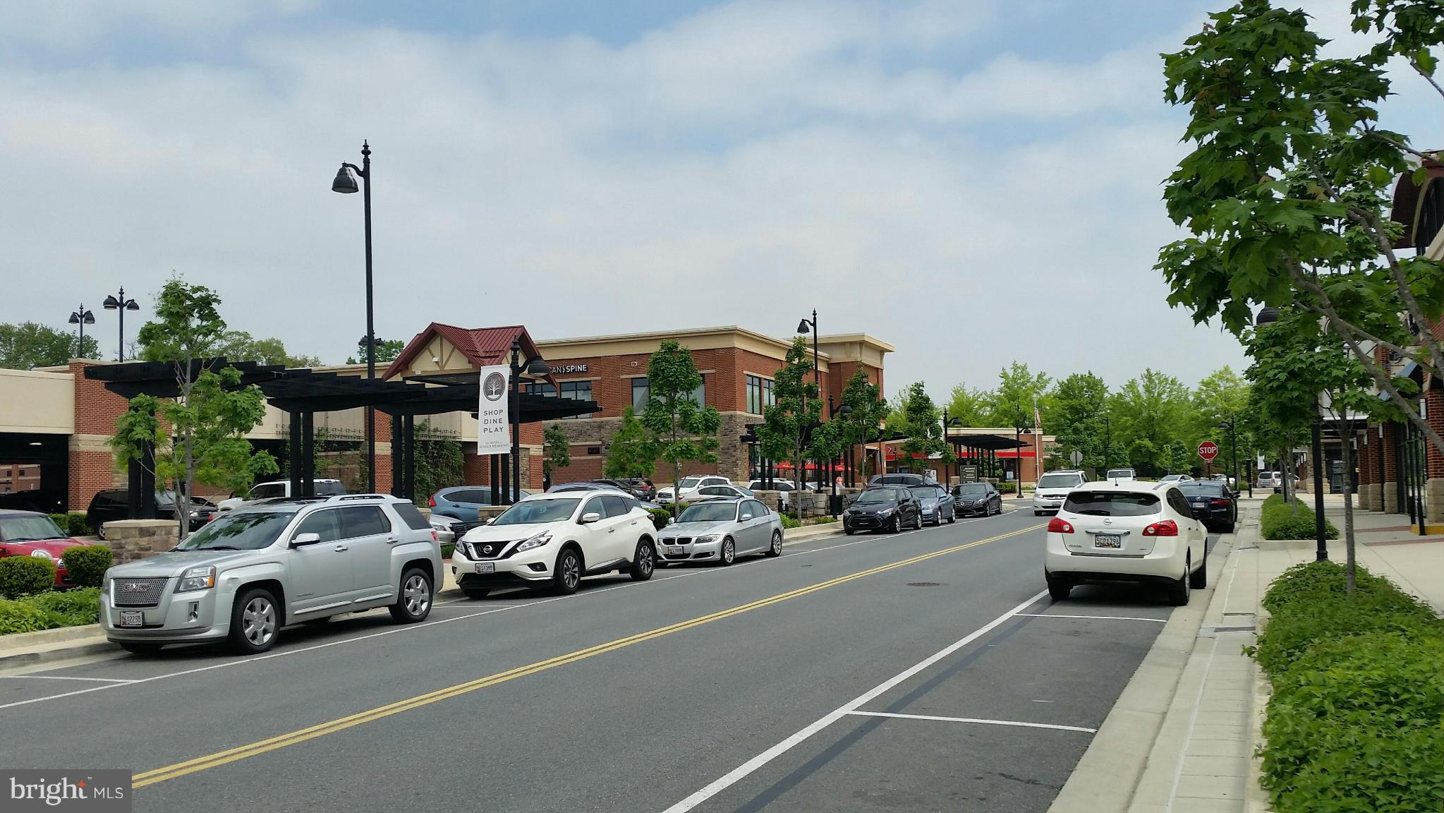 13310 Country Ridge Drive Germantown, MD 20874 - Photo 25 of 26 a view of car parked on the road