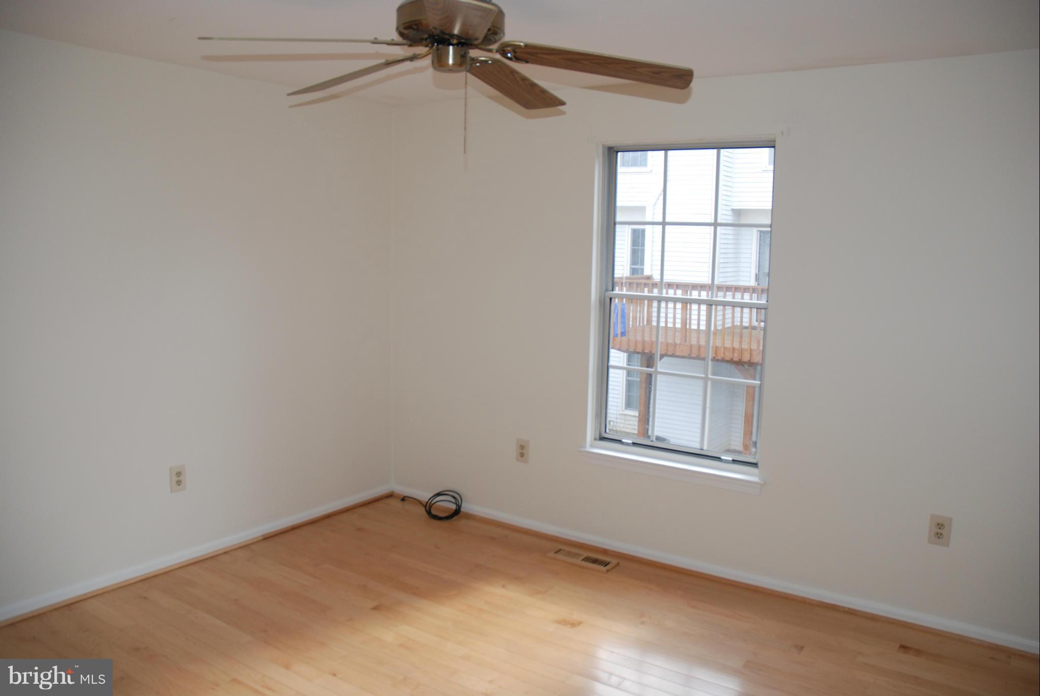 13310 Country Ridge Drive Germantown, MD 20874 - Photo 10 of 26 an empty room with a window