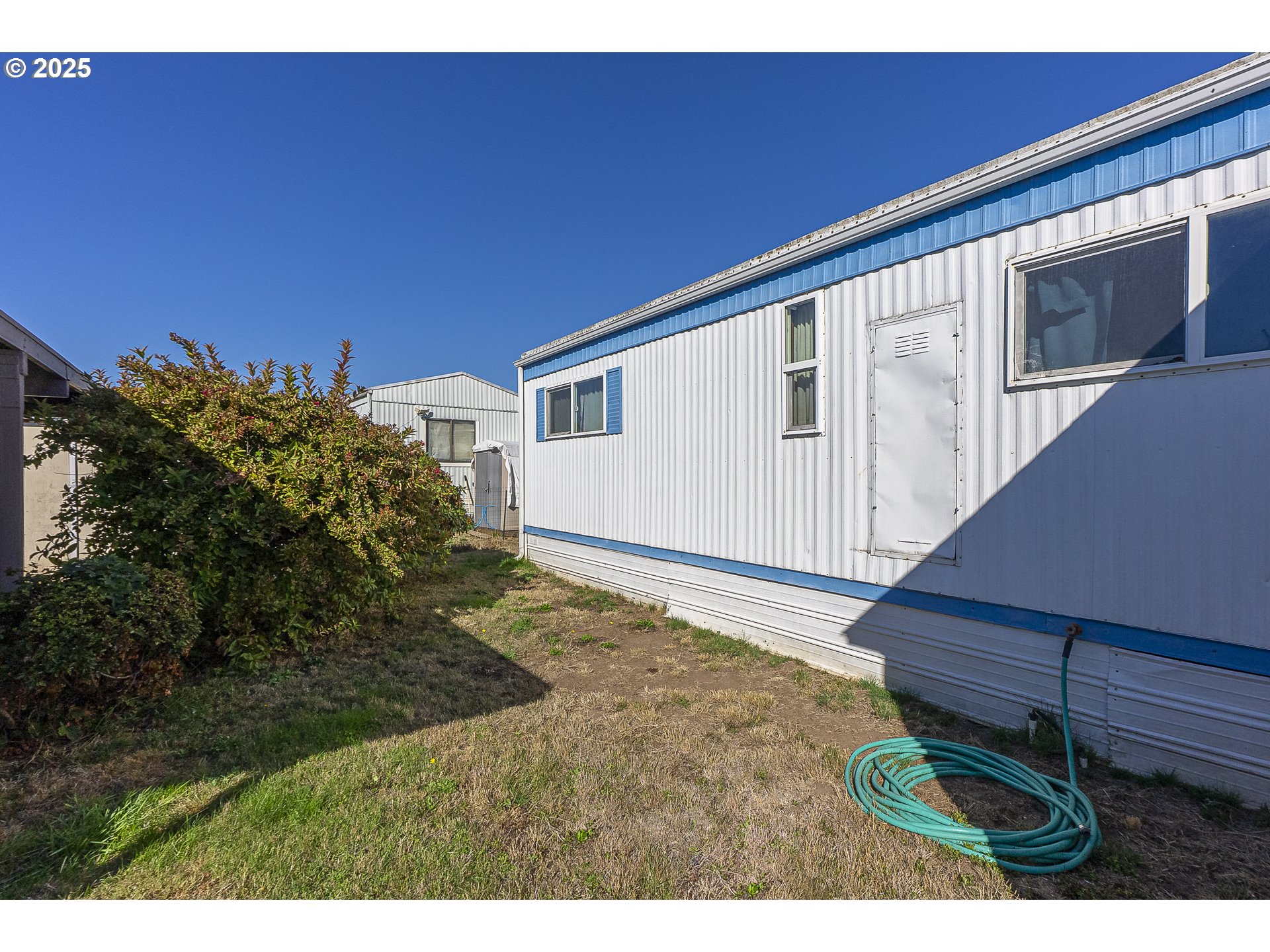 2150 Laura Street, Unit 57 Springfield, OR 97477 - Photo 14 of 23 a view of outdoor space and yard