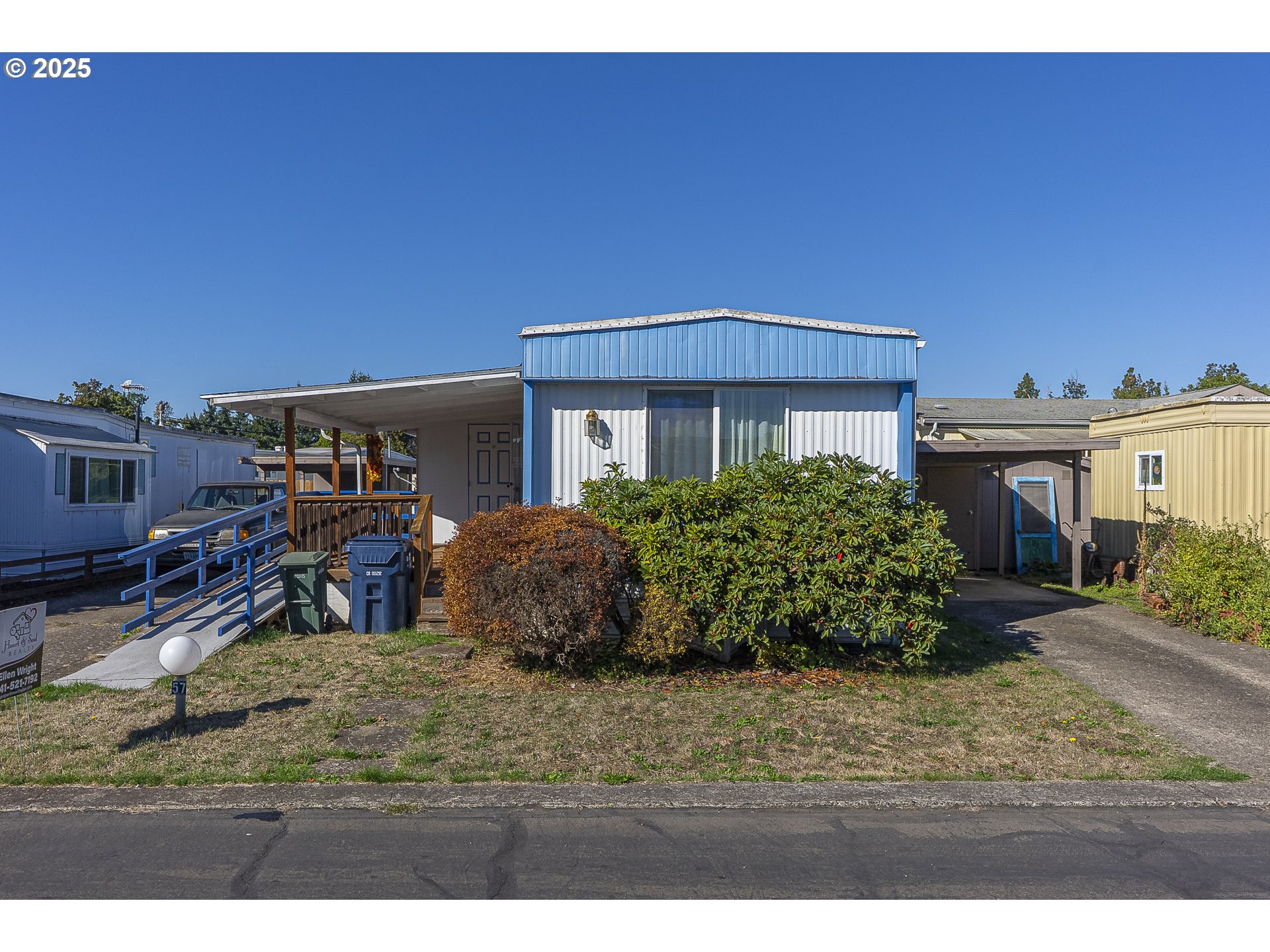 2150 Laura Street, Unit 57 Springfield, OR 97477 - Photo 15 of 23 a view of a house with a patio