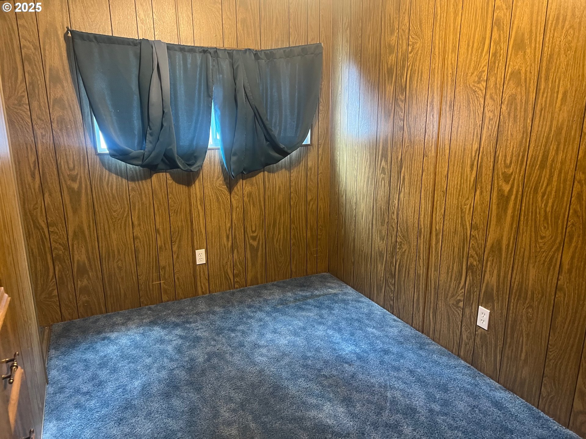 2150 Laura Street, Unit 57 Springfield, OR 97477 - Photo 8 of 23 a view of a wooden door