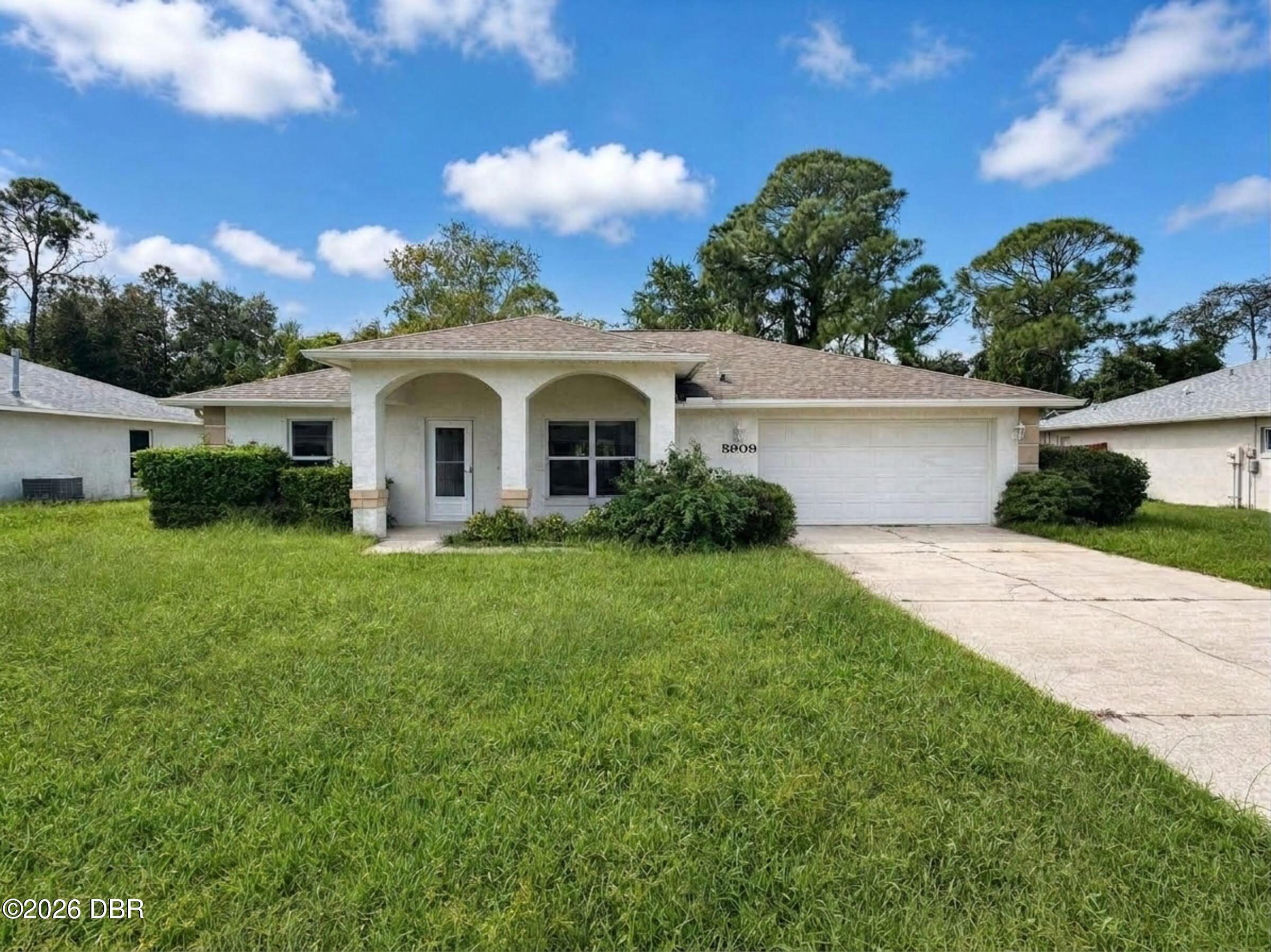5909 Springview Drive Port Orange, FL 32127 - Photo 1 of 11 02-exterior_front_of_house_2 (2)