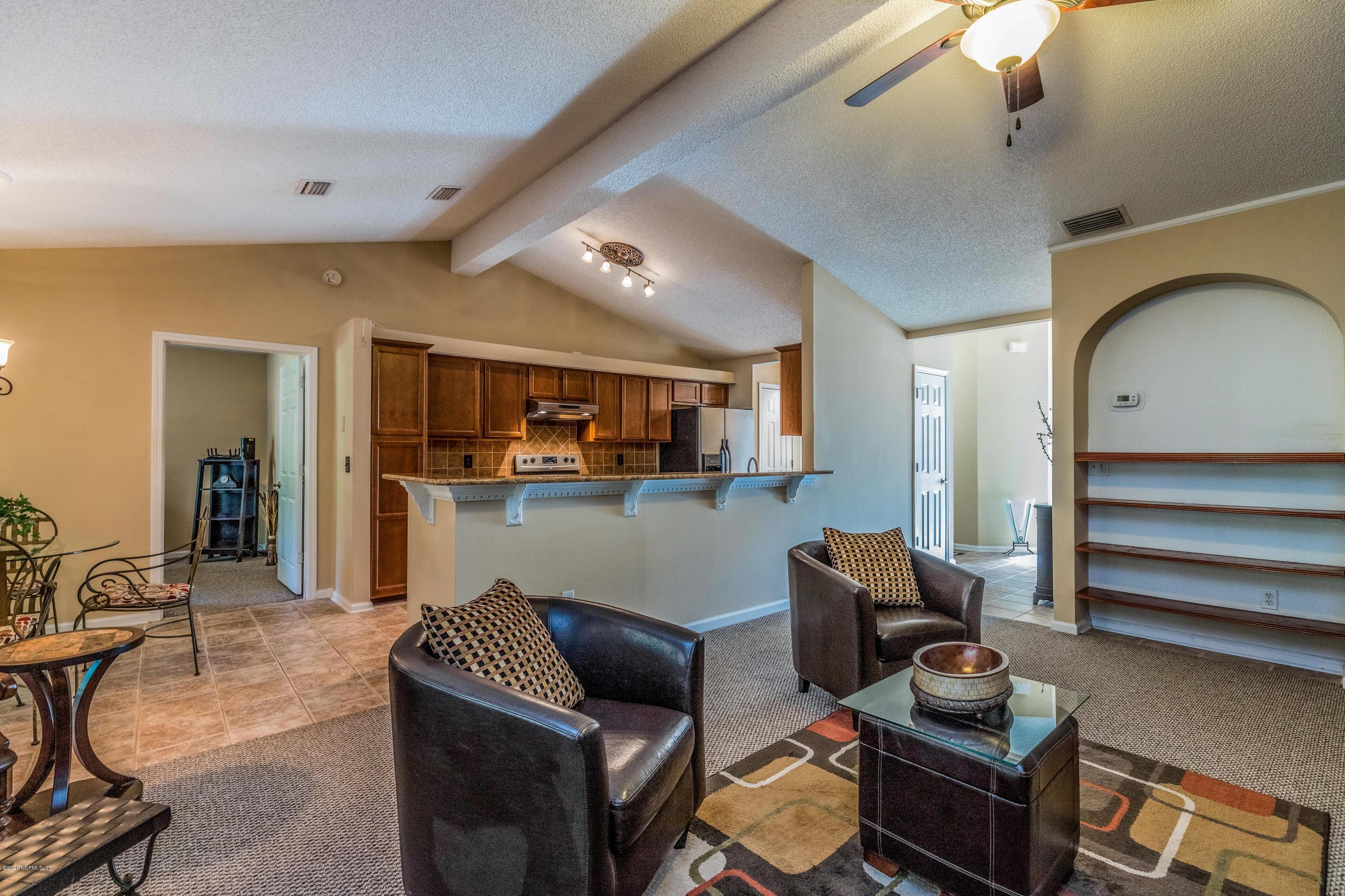 1504 Marsh Rabbit Way Fleming Island, FL 32003 - Photo 20 of 72 Family Room view to Kitchen
