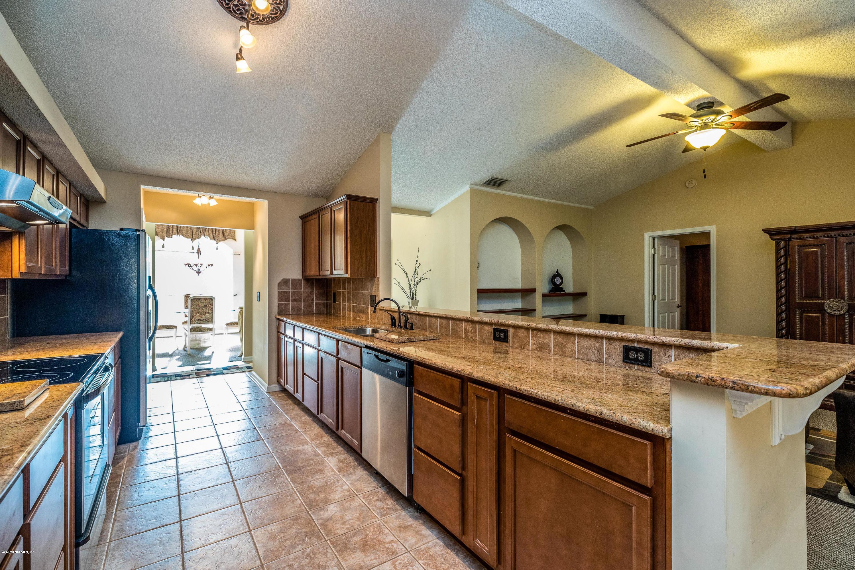 1504 Marsh Rabbit Way Fleming Island, FL 32003 - Photo 23 of 72 Kitchen w/Granite